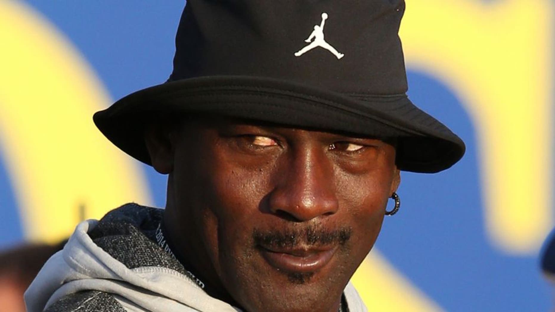 Sep 27, 2014; Auchterarder, Perthshire, SCT; NBA legend Michael Jordan watches the players tee off on hole one during day two of the 2014 Ryder Cup at Gleneagles Resort - PGA Centenary Course. Mandatory Credit: Brian Spurlock-USA TODAY Sports