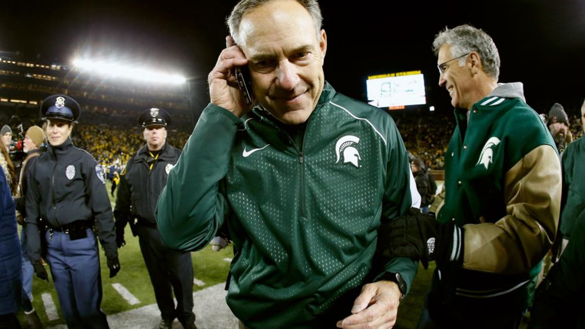 ANN ARBOR, MI - OCTOBER 17: Head coach Mark Dantonio of the Michigan State Spartans walks off the field after defeating the Michigan Wolverines 27-23 in the college football game at Michigan Stadium on October 17, 2015 in Ann Arbor, Michigan. (Photo by Christian Petersen/Getty Images)