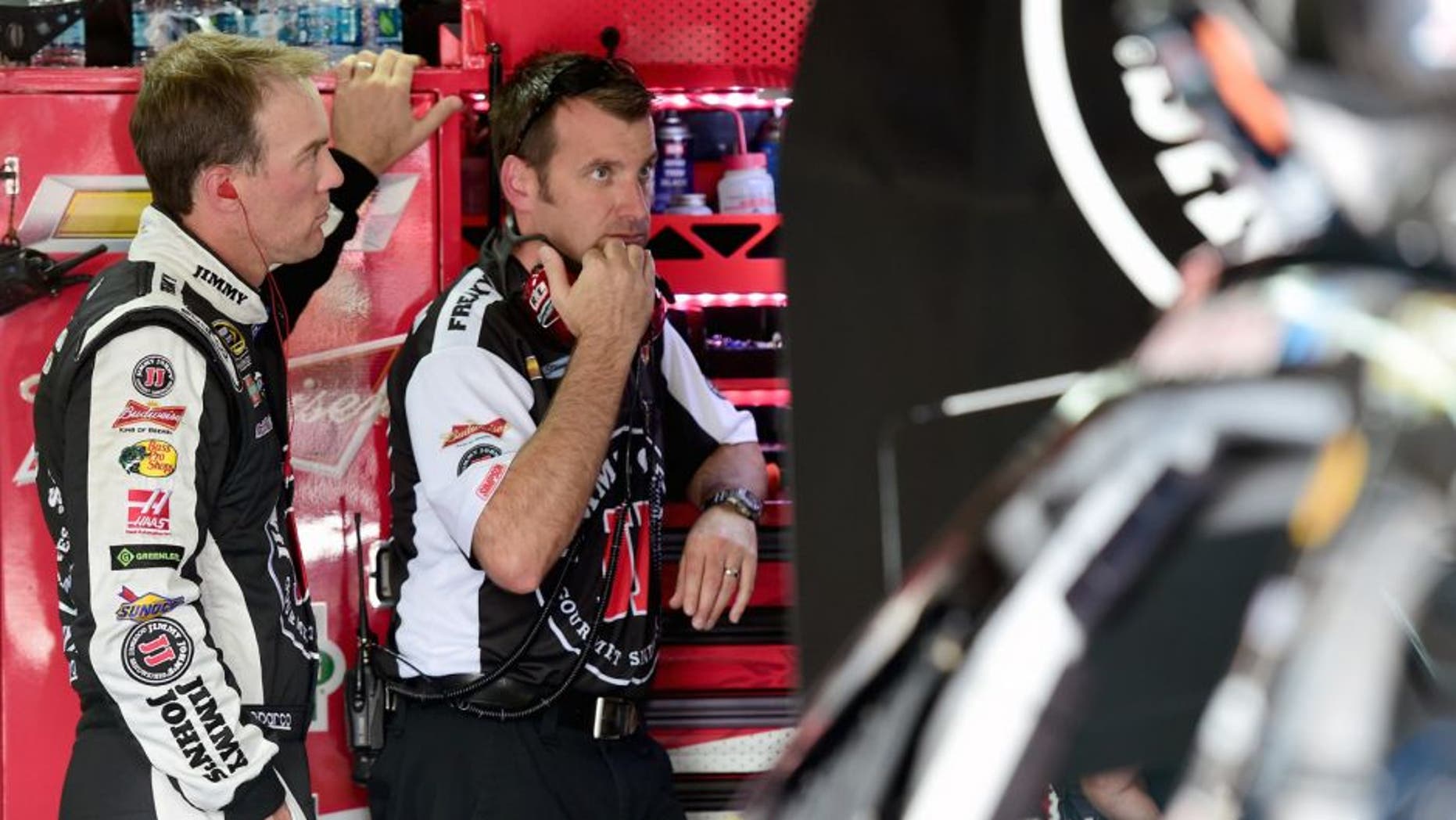 CHARLOTTE, NC - OCTOBER 08: Kevin Harvick, driver of the #4 Jimmy John's/Budweiser Chevrolet, and his crew chief Rodney Childers look on during practice for the NASCAR Sprint Cup Series Bank of America 500 at Charlotte Motor Speedway on October 8, 2015 in Charlotte, North Carolina. (Photo by Jared C. Tilton/NASCAR via Getty Images)