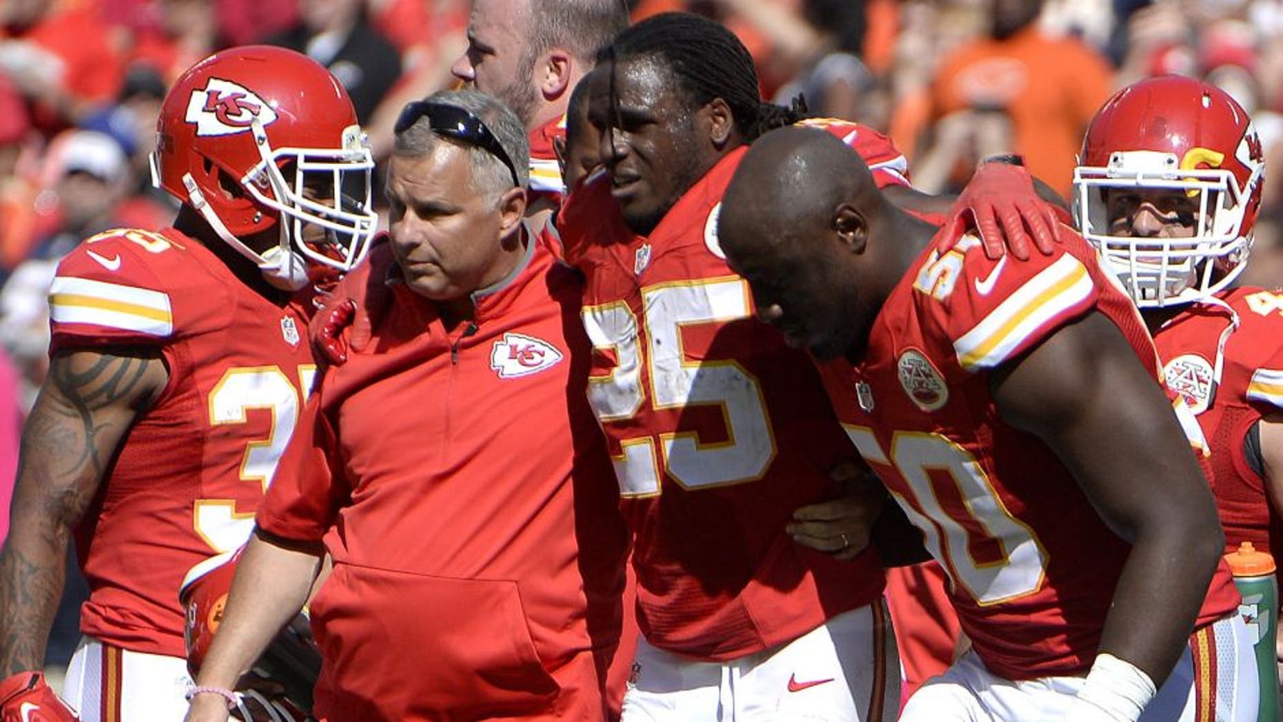 Oct 11, 2015; Kansas City, MO, USA; Kansas City Chiefs running back Jamaal Charles (25) is helped off the field against the Chicago Bears in the second half at Arrowhead Stadium. Chicago won the game 18-17. Mandatory Credit: John Rieger-USA TODAY Sports