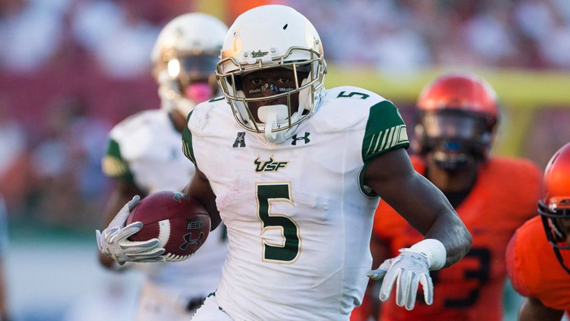 Oct 10, 2015; Tampa, FL, USA; South Florida Bulls running back Marlon Mack (5) runs for a touchdown in the third quarter against the Syracuse Orange at Raymond James Stadium. The South Florida Bulls won 45-24. Mandatory Credit: Logan Bowles-USA TODAY Sports