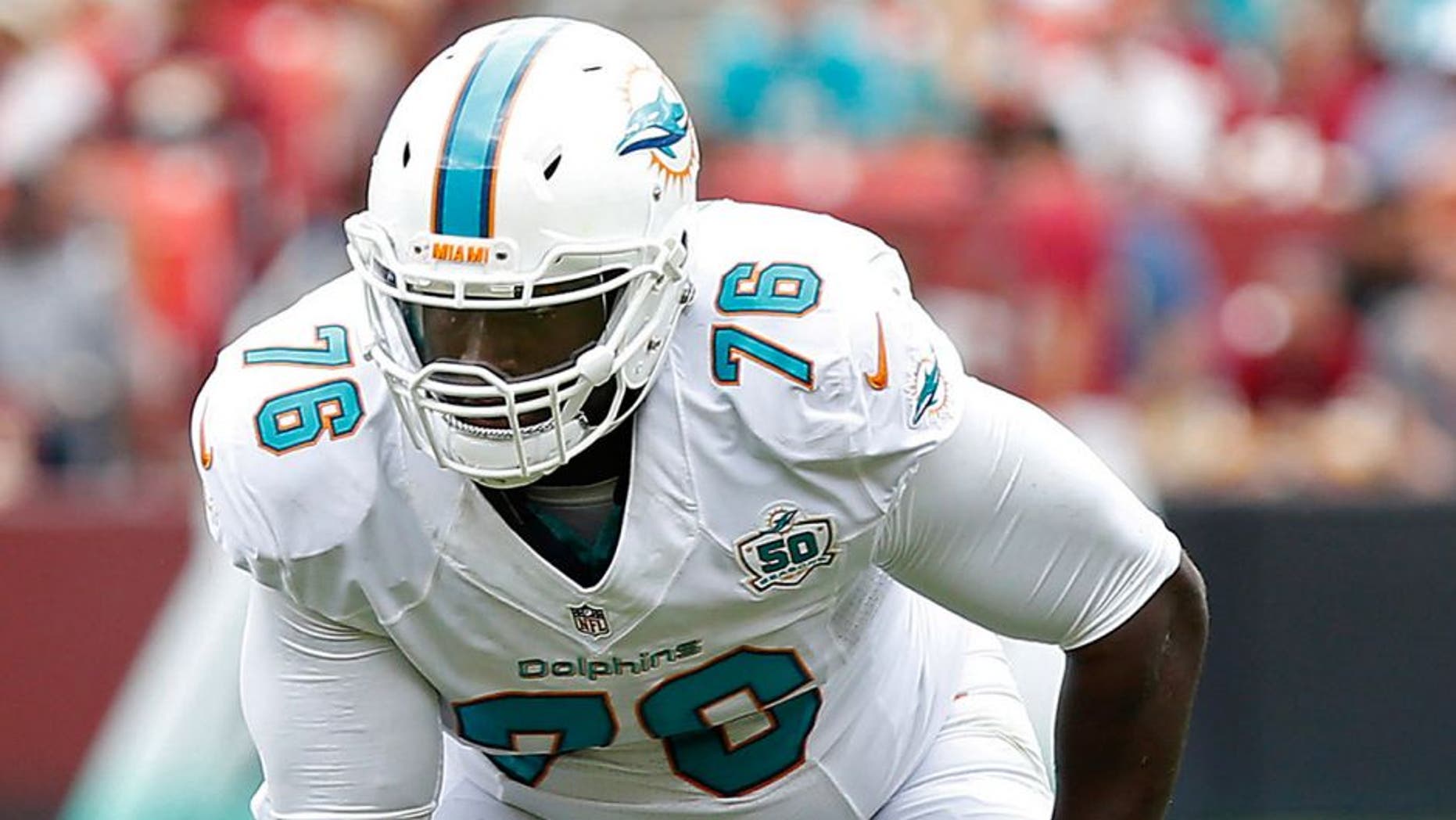 Sep 13, 2015; Landover, MD, USA; Miami Dolphins offensive tackle Branden Albert (76) lines up against the Washington Redskins at FedEx Field. Mandatory Credit: Geoff Burke-USA TODAY Sports