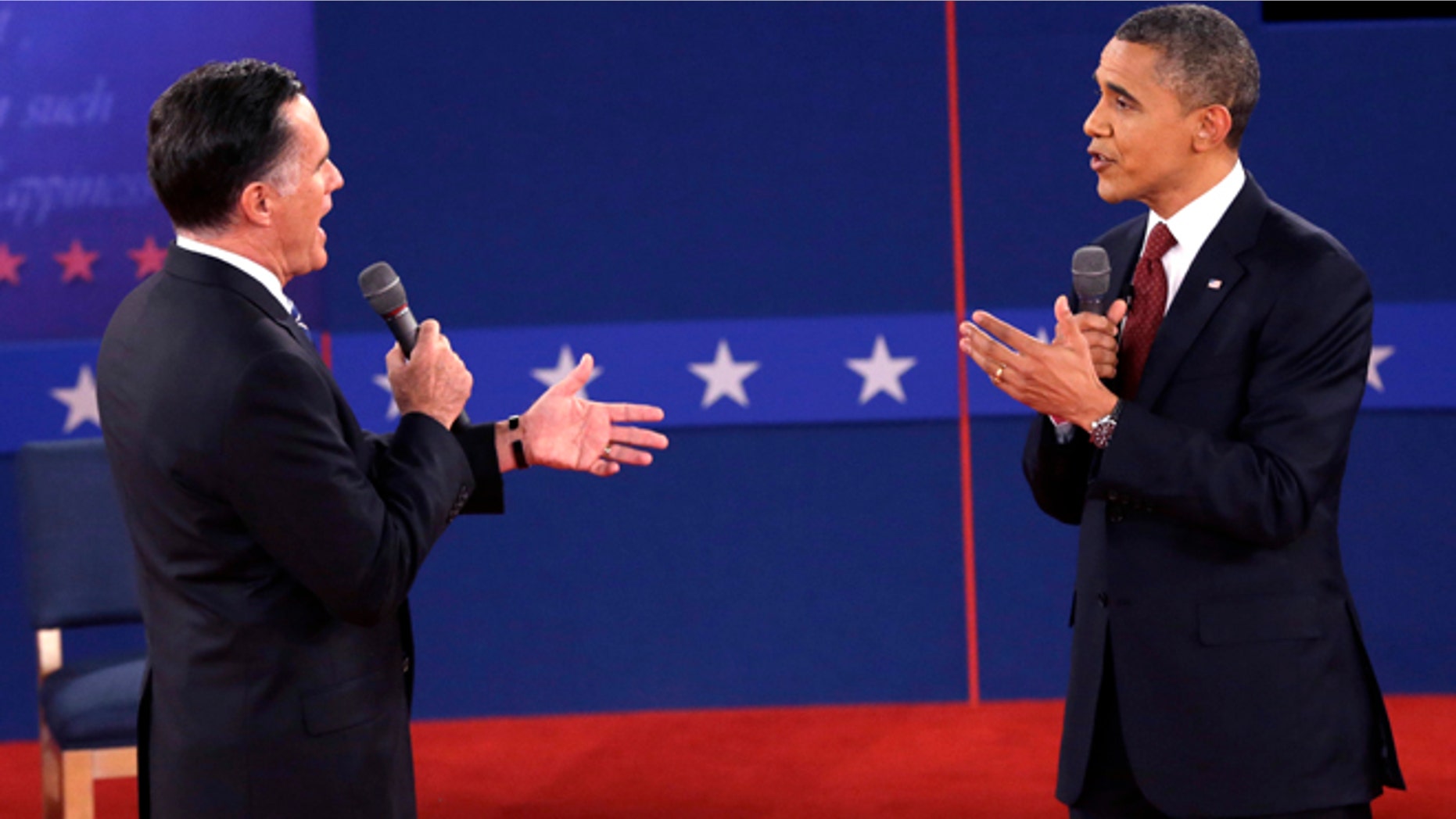 Oct. 16, 2012: Republican presidential nominee Mitt Romney and President Barack Obama speak during the second presidential debate.