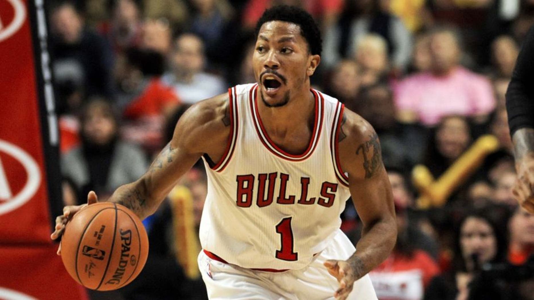 Oct 16, 2014; Chicago, IL, USA; Chicago Bulls guard Derrick Rose (1) during the first half of their pre-season game against the Atlanta Hawks at the United Center. Mandatory Credit: Matt Marton-USA TODAY Sports