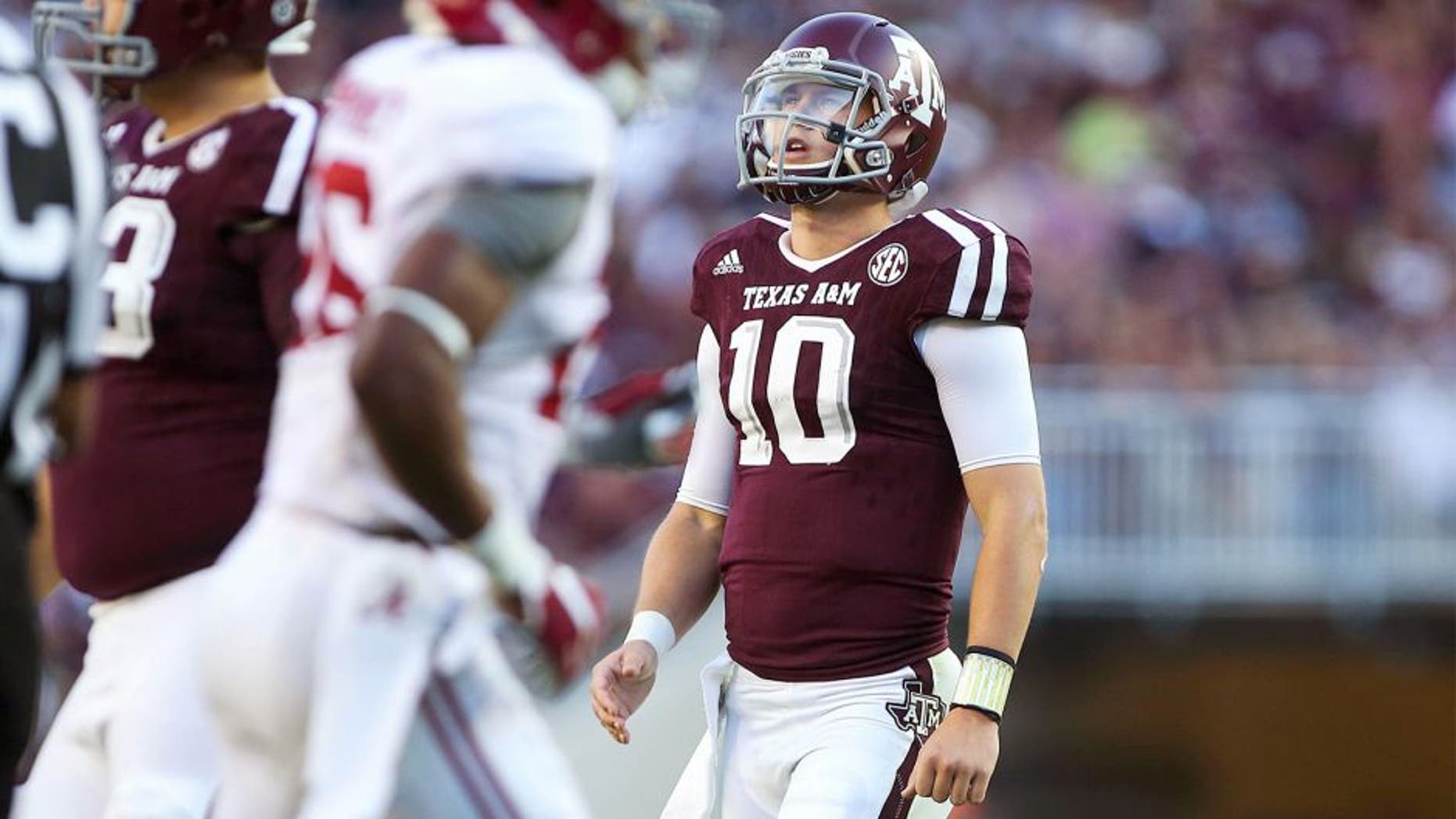 Oct 17, 2015; College Station, TX, USA; Texas A&M Aggies quarterback Kyle Allen (10) looks up after a play during the fourth quarter against the Alabama Crimson Tide at Kyle Field. The Crimson Tide defeated the Aggies 41-23. Mandatory Credit: Troy Taormina-USA TODAY Sports