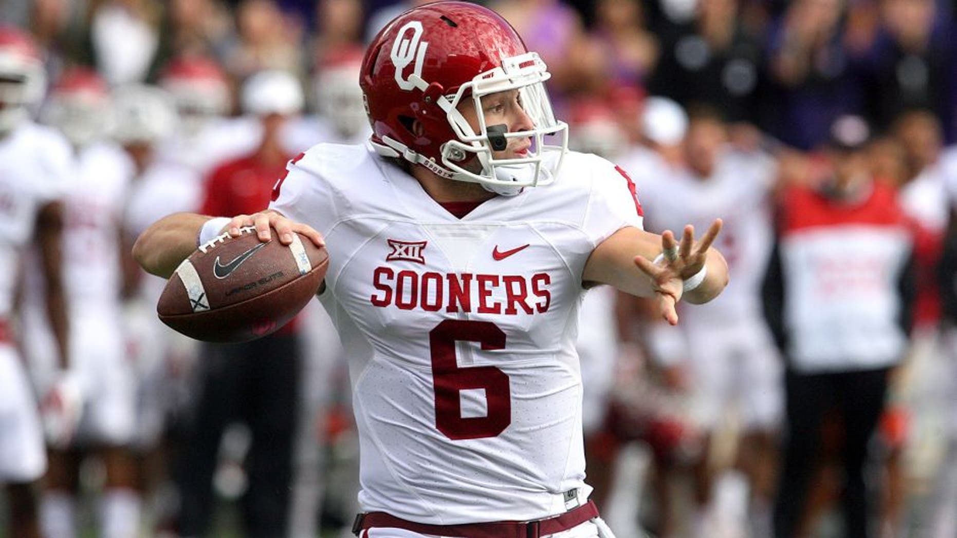 Oct 17, 2015; Manhattan, KS, USA; Oklahoma Sooners quarterback Baker Mayfield (6) drops back to pass early in a game against the Kansas State Wildcats at Bill Snyder Family Football Stadium. Mandatory Credit: Scott Sewell-USA TODAY Sports