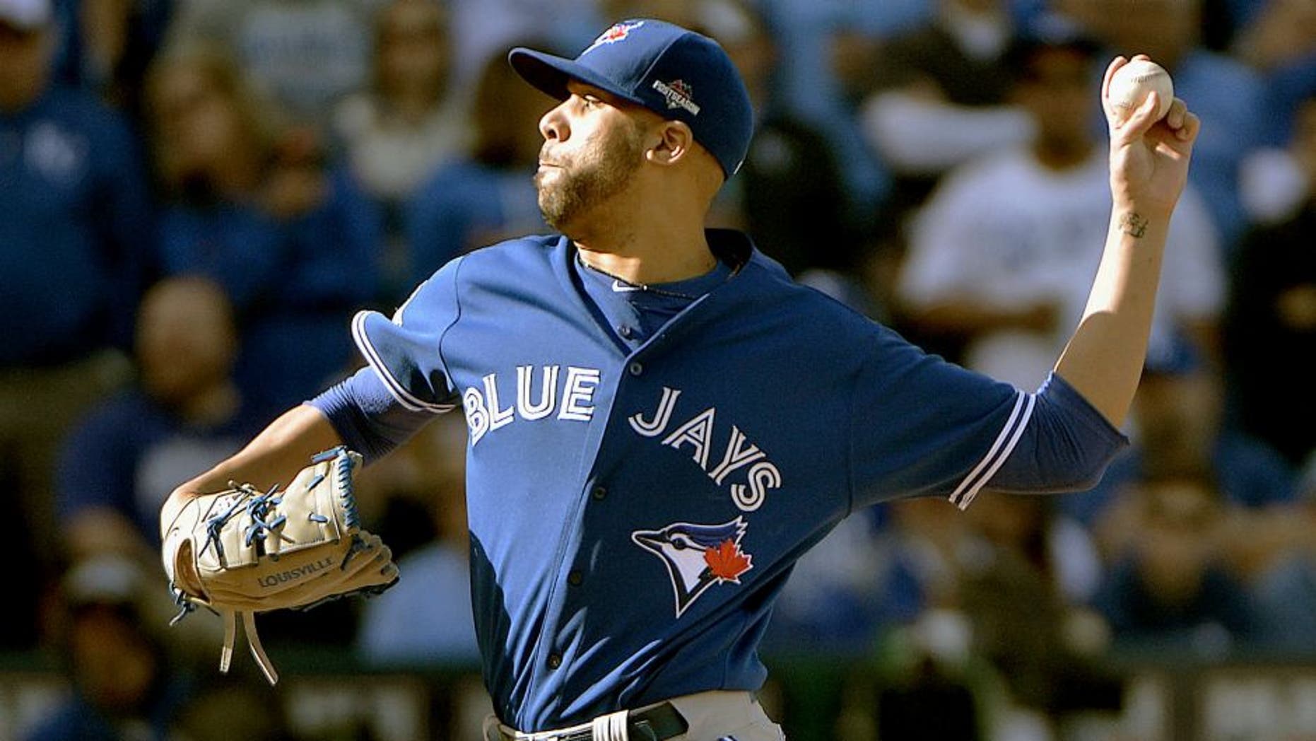 Oct 17, 2015; Kansas City, MO, USA; Toronto Blue Jays starting pitcher David Price (14) pitches during the first inning against the Kansas City Royals in game two of the ALCS at Kauffman Stadium. Mandatory Credit: Denny Medley-USA TODAY Sports
