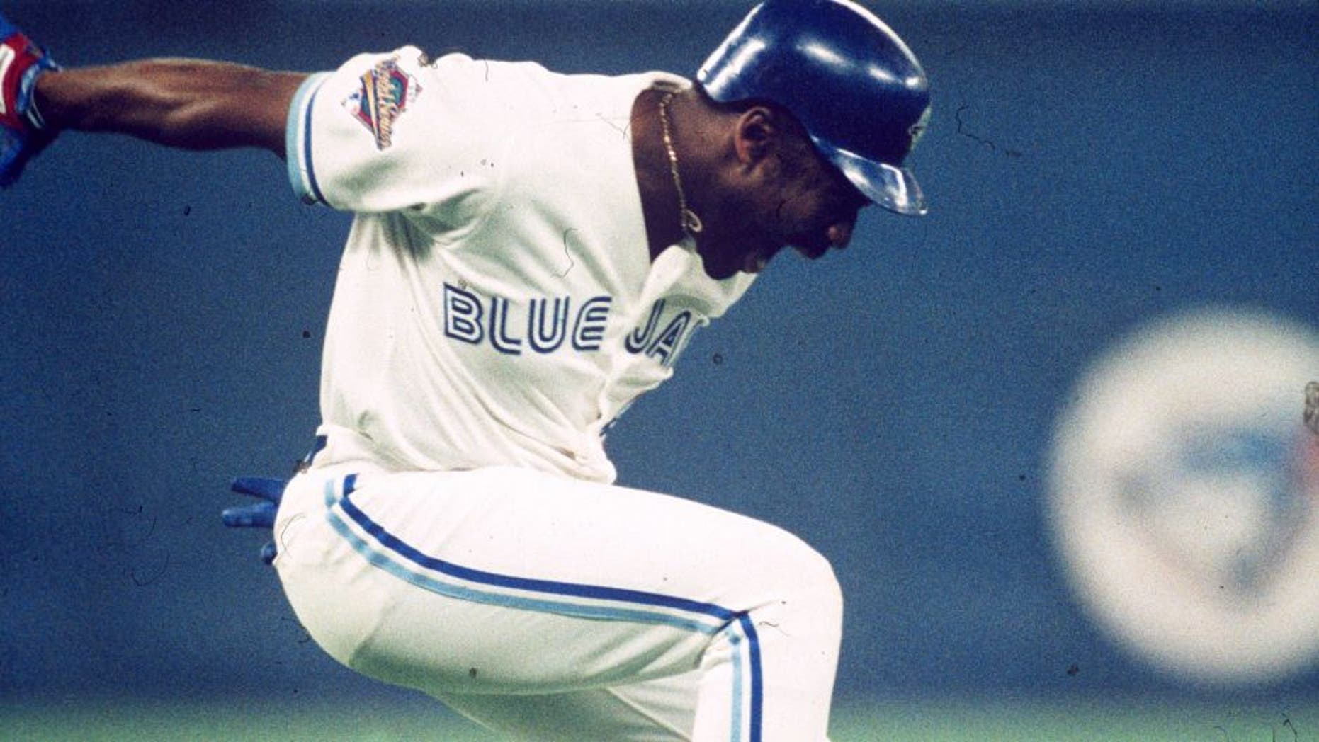 TORONTO, ON - OCTOBER 23: Joe Carter #29 of the Toronto Blue Jays celebrates after hitting a walk off home run in the ninth inning during Game Six of the 1993 World Series at the Toronto SkyDome on October 23, 1993 in Toronto, Ontario, Canada. (Photo by MLB Photos)