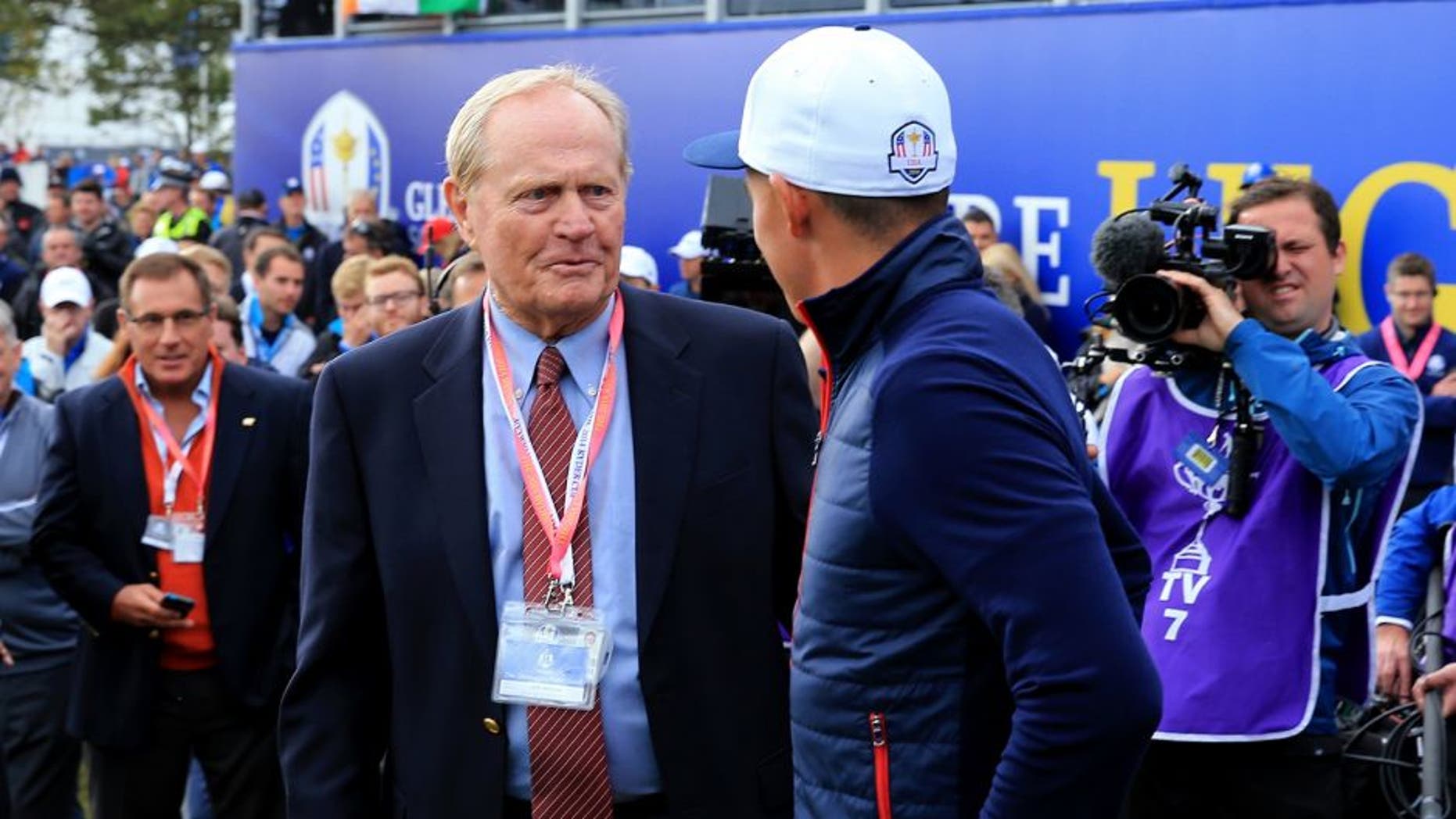 AUCHTERARDER, SCOTLAND - SEPTEMBER 28: Rickie Fowler of the United States (R) and Jack Nicklaus in discussion at the 1st tee during the Singles Matches of the 2014 Ryder Cup on the PGA Centenary course at the Gleneagles Hotel on September 28, 2014 in Auchterarder, Scotland. (Photo by David Cannon/Getty Images)