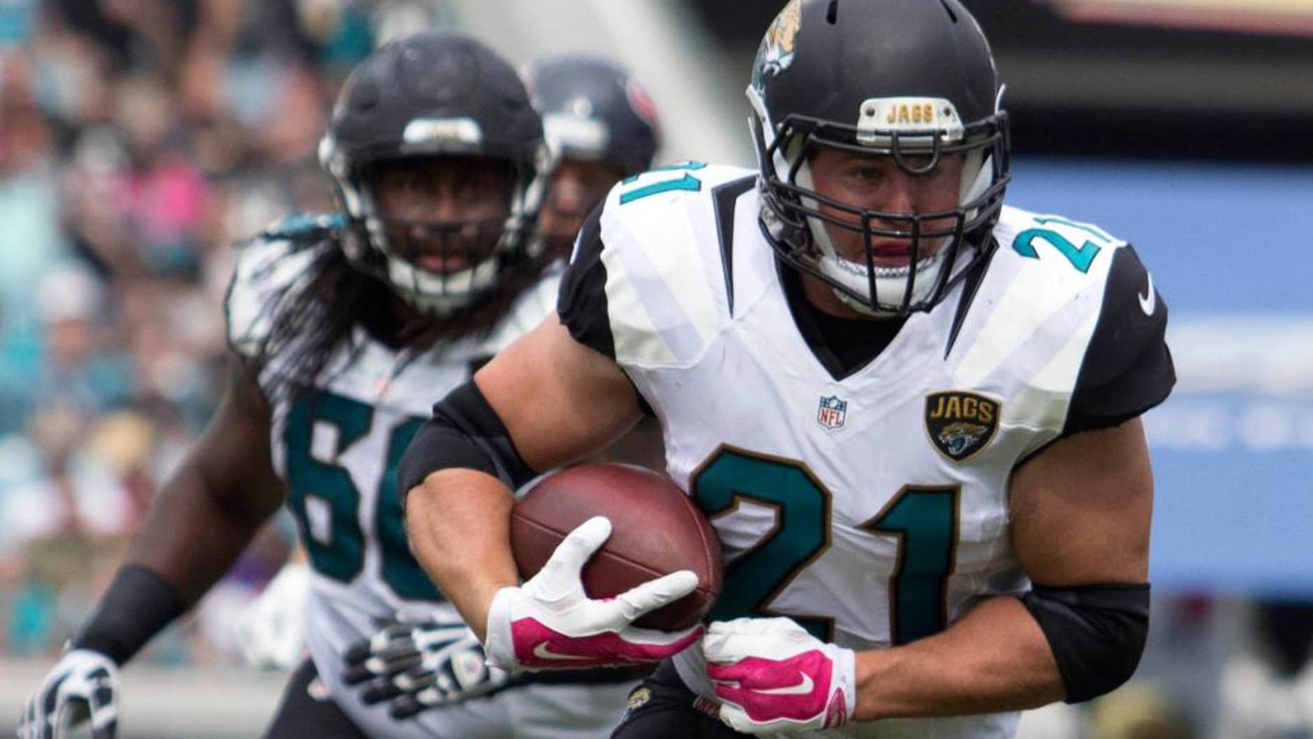 Oct 18, 2015; Jacksonville, FL, USA; Jacksonville Jaguars running back Toby Gerhart (21) runs during the second quarter against the Houston Texans at EverBank Field. Mandatory Credit: Logan Bowles-USA TODAY Sports