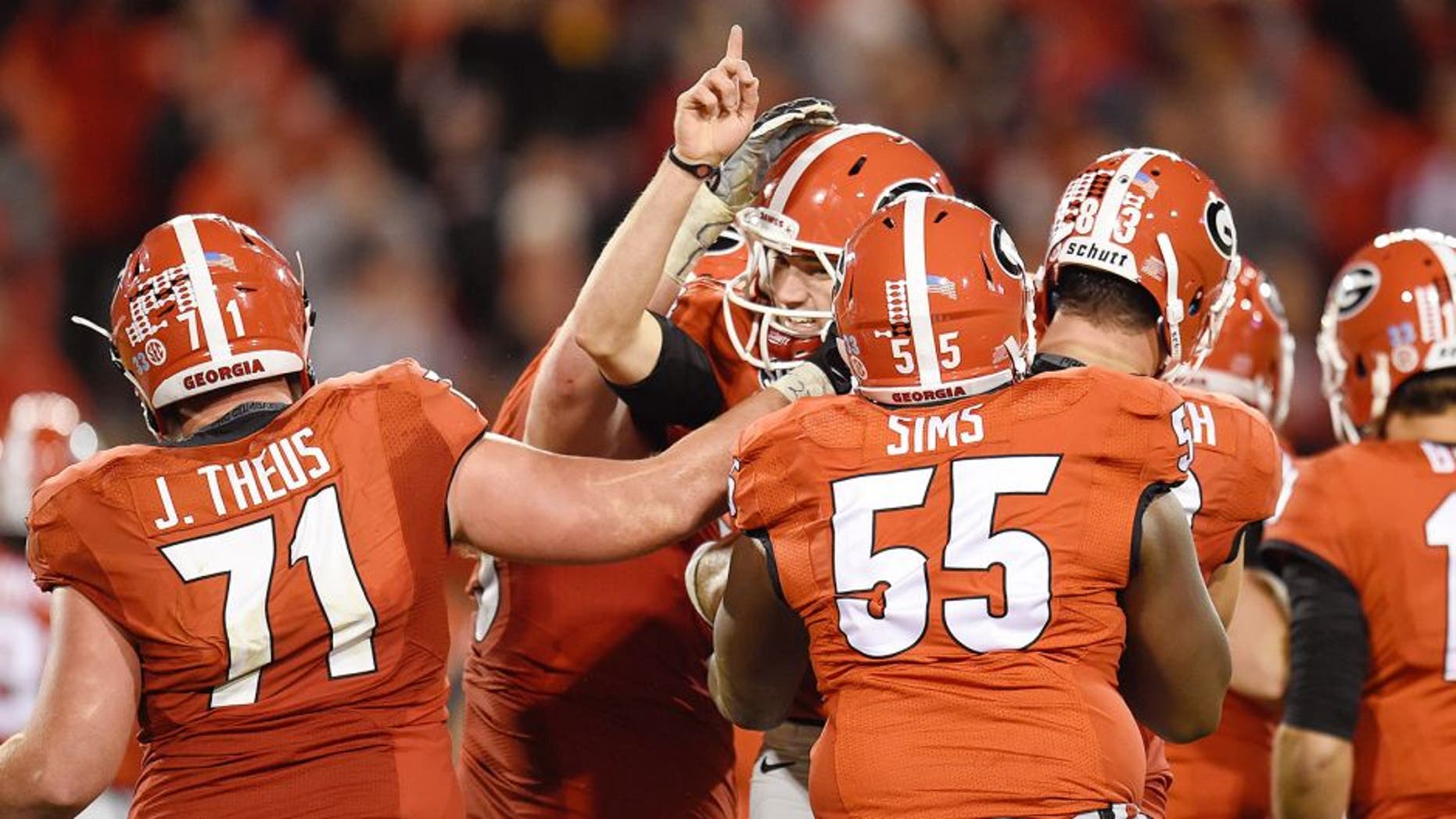 Oct 17, 2015; Athens, GA, USA; Georgia Bulldogs place kicker Marshall Morgan (finger raised) and team mates react after he kicked the go ahead field goal against the Missouri Tigers during the second half at Sanford Stadium. Georgia defeated Missouri 9-6. Mandatory Credit: Dale Zanine-USA TODAY Sports