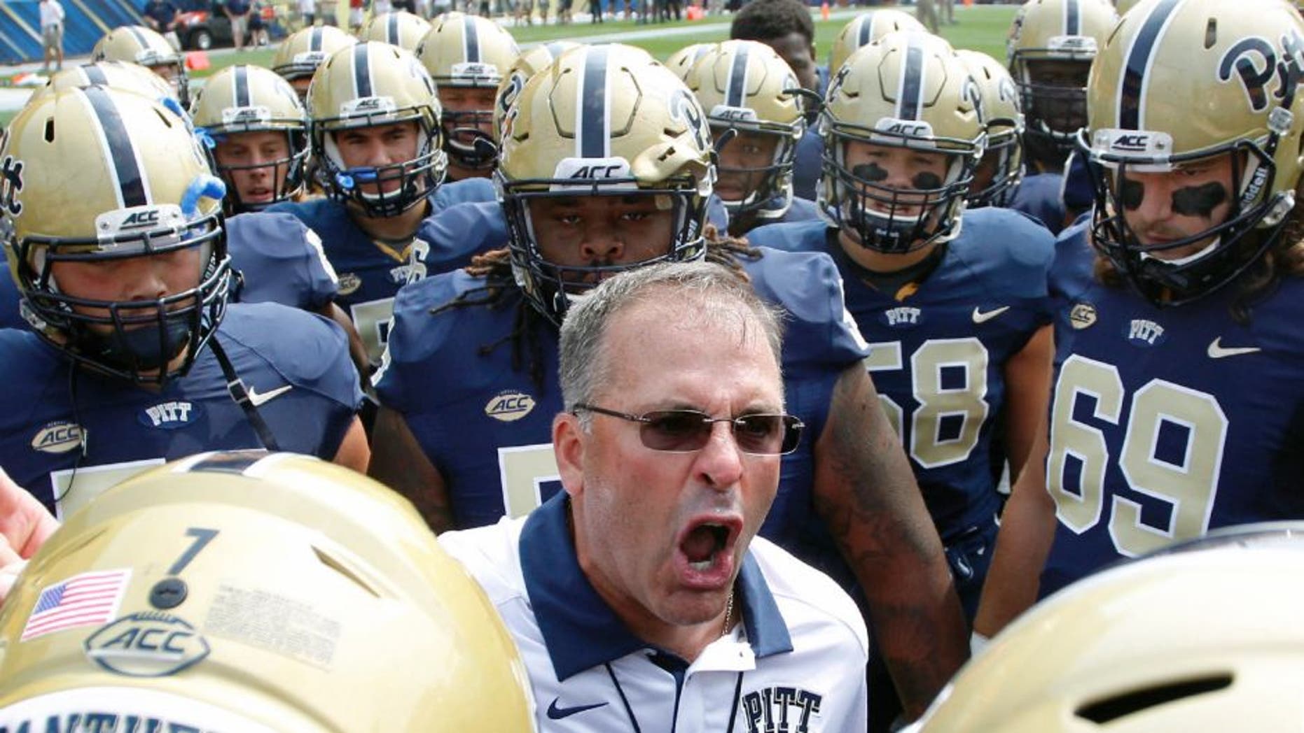 Sep 5, 2015; Pittsburgh, PA, USA; Pittsburgh Panthers head coach Pat Narduzzi (C) talks to his team prior to their game against the Youngstown State Penguins at Heinz Field. Mandatory Credit: Charles LeClaire-USA TODAY Sports