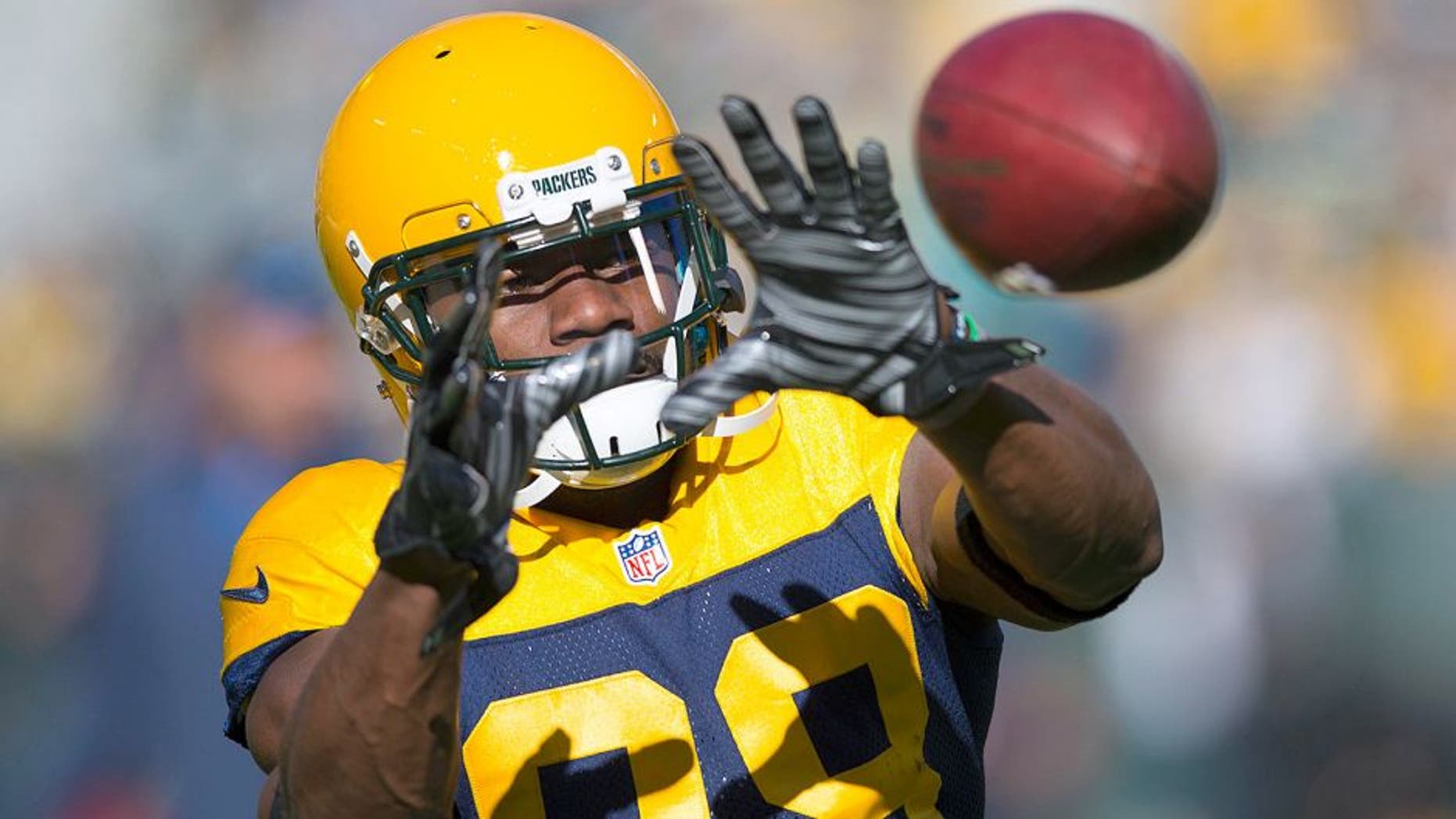 Oct 18, 2015; Green Bay, WI, USA; Green Bay Packers wide receiver Ty Montgomery (88) catches a pass during warmups prior to the game against the San Diego Chargers at Lambeau Field. Mandatory Credit: Jeff Hanisch-USA TODAY Sports