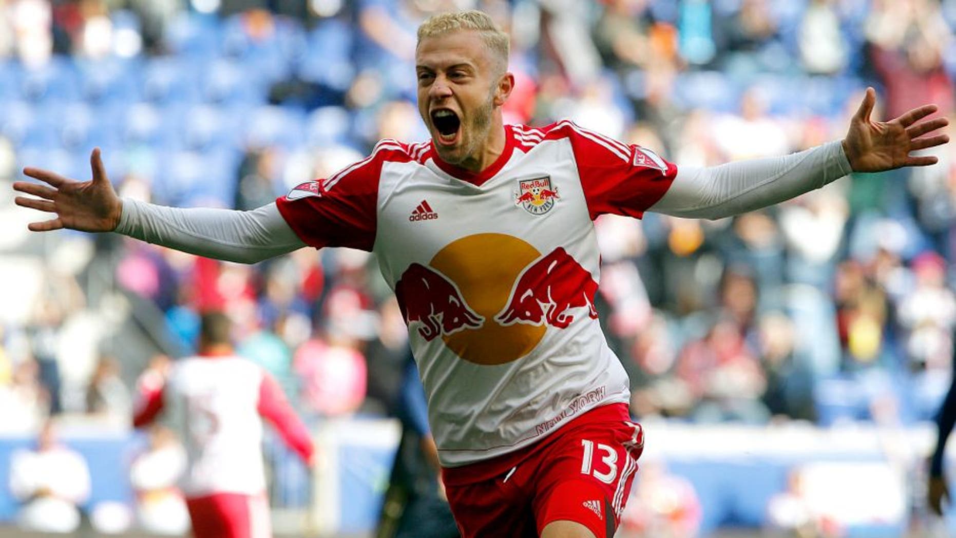 Oct 18, 2015; Harrison, NJ, USA; New York Red Bulls forward Mike Grella (13) reacts after a goal during first half against Philadelphia Union at Red Bull Arena. Mandatory Credit: Noah K. Murray-USA TODAY Sports