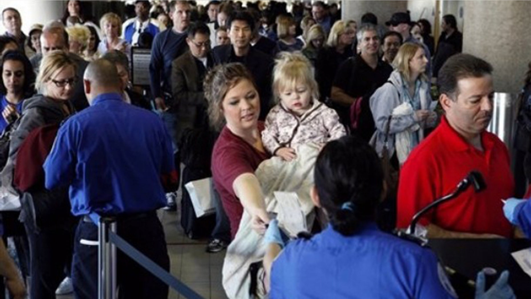 April 8: Airline passengers line-up inside terminals at Los Angeles International Airport after several terminals were closed due to a security breach.
