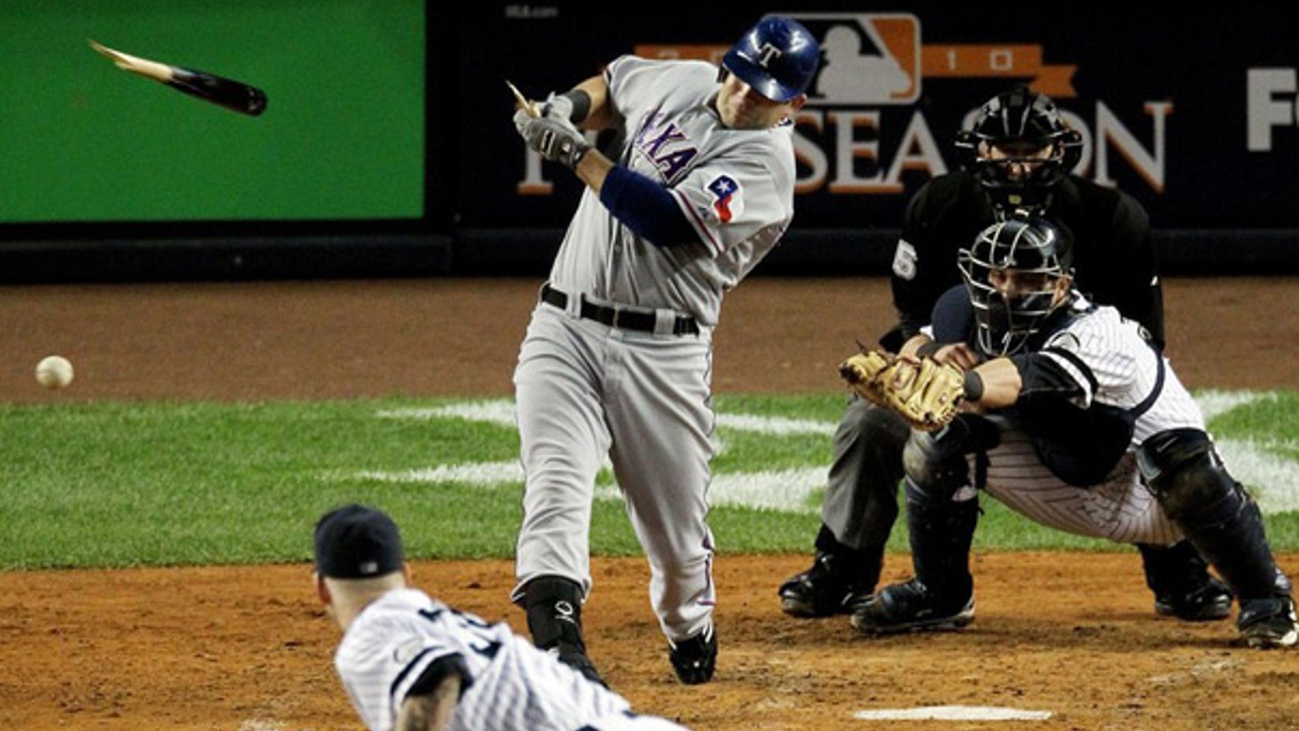 Oct. 19: Mitch Moreland of the Rangers breaks his bat on a pitch by A.J. Burnett of the Yankees in Game Four of the ALCS.