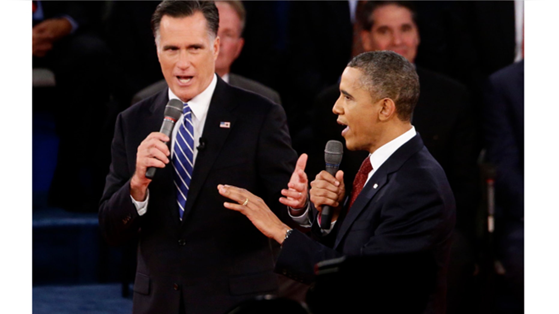 FILE: Oct. 16, 2012: President Barack Obama and Mitt Romney in the second presidential debate, at Hofstra University, in Long Island, N.Y.
