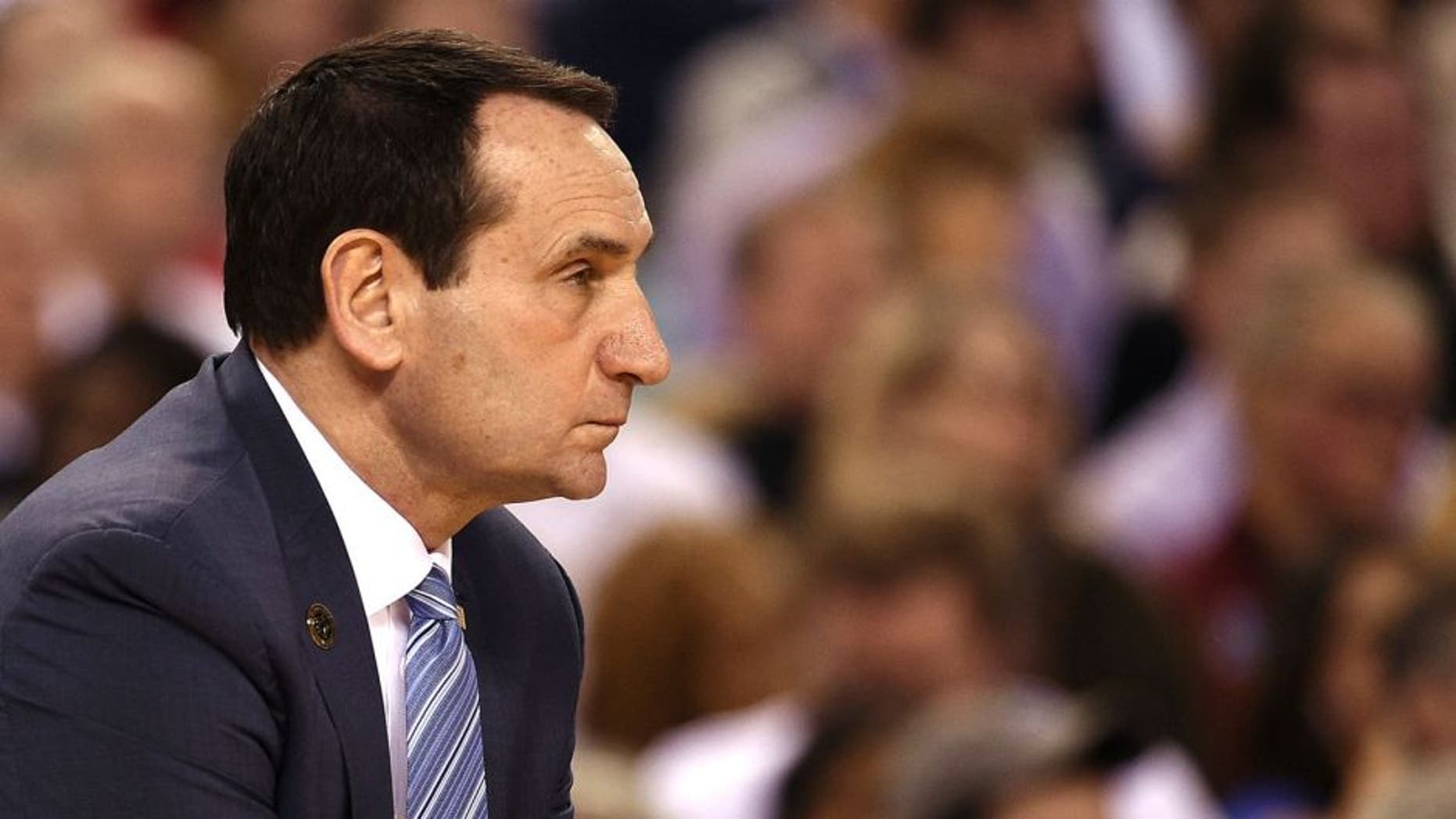 INDIANAPOLIS, IN - APRIL 04: Head Coach Mike Krzyzewski of the Duke Blue Devils looks on against the Michigan State Spartans during the NCAA Men's Final Four Semifinal at Lucas Oil Stadium on April 4, 2015 in Indianapolis, Indiana. Duke won 81-61. (Photo by Lance King/Getty Images)