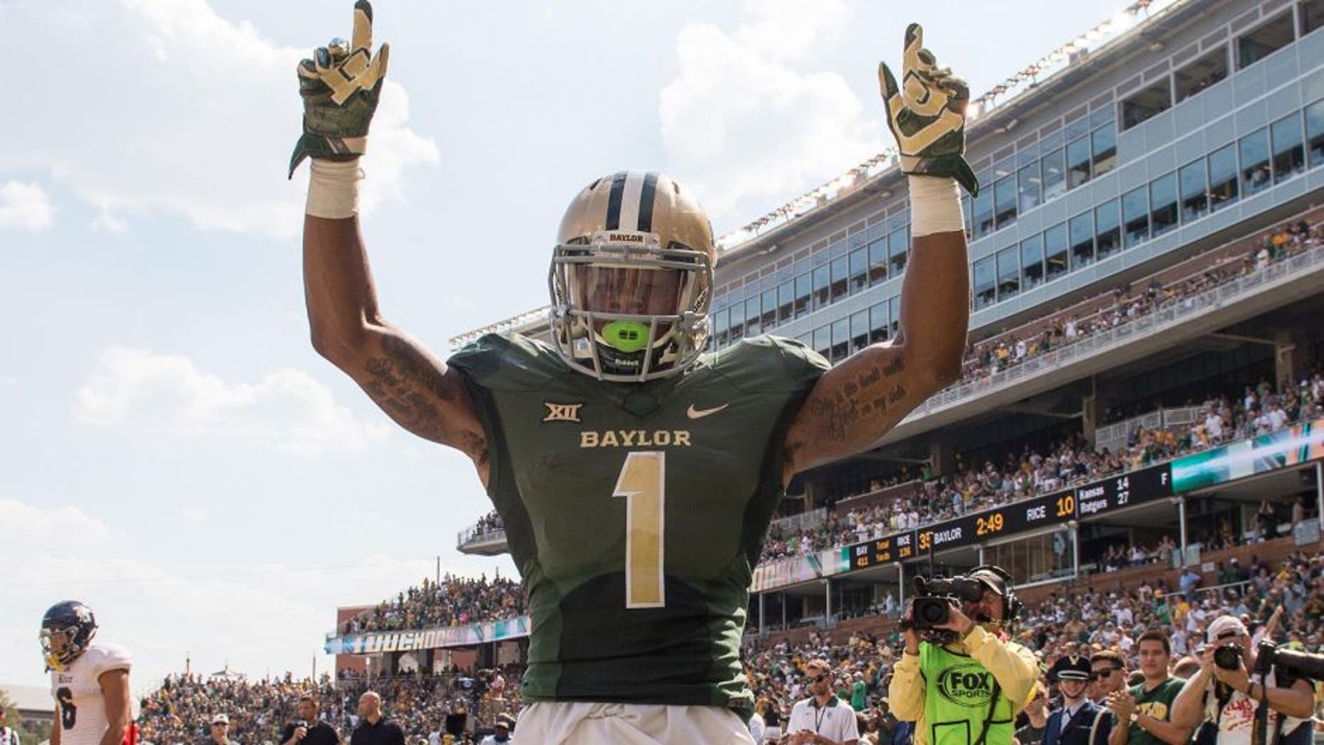 Sep 26, 2015; Waco, TX, USA; Baylor Bears wide receiver Corey Coleman (1) celebrates his touchdown against the Rice Owls during the second quarter at McLane Stadium. Mandatory Credit: Jerome Miron-USA TODAY Sports
