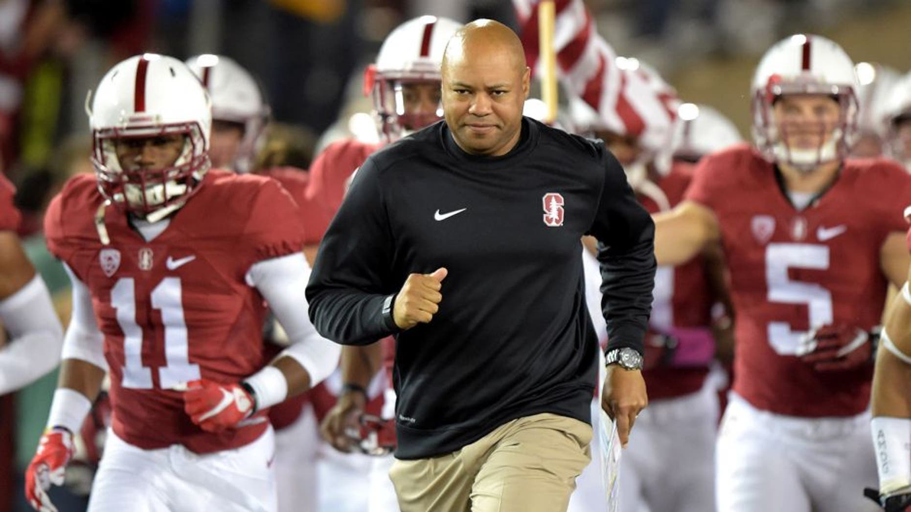 Oct 15, 2015; Stanford, CA, USA; Stanford Cardinal coach David Shaw leads players onto field before the NCAA football game against the UCLA Bruins at Stanford Stadium. Mandatory Credit: Kirby Lee-USA TODAY Sports