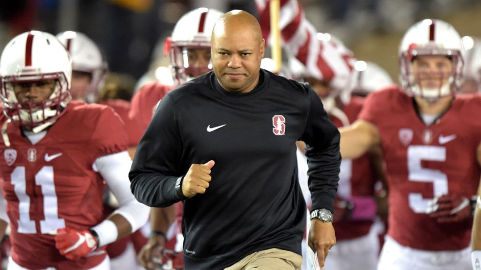 Oct 15, 2015; Stanford, CA, USA; Stanford Cardinal coach David Shaw leads players onto field before the NCAA football game against the UCLA Bruins at Stanford Stadium. Mandatory Credit: Kirby Lee-USA TODAY Sports