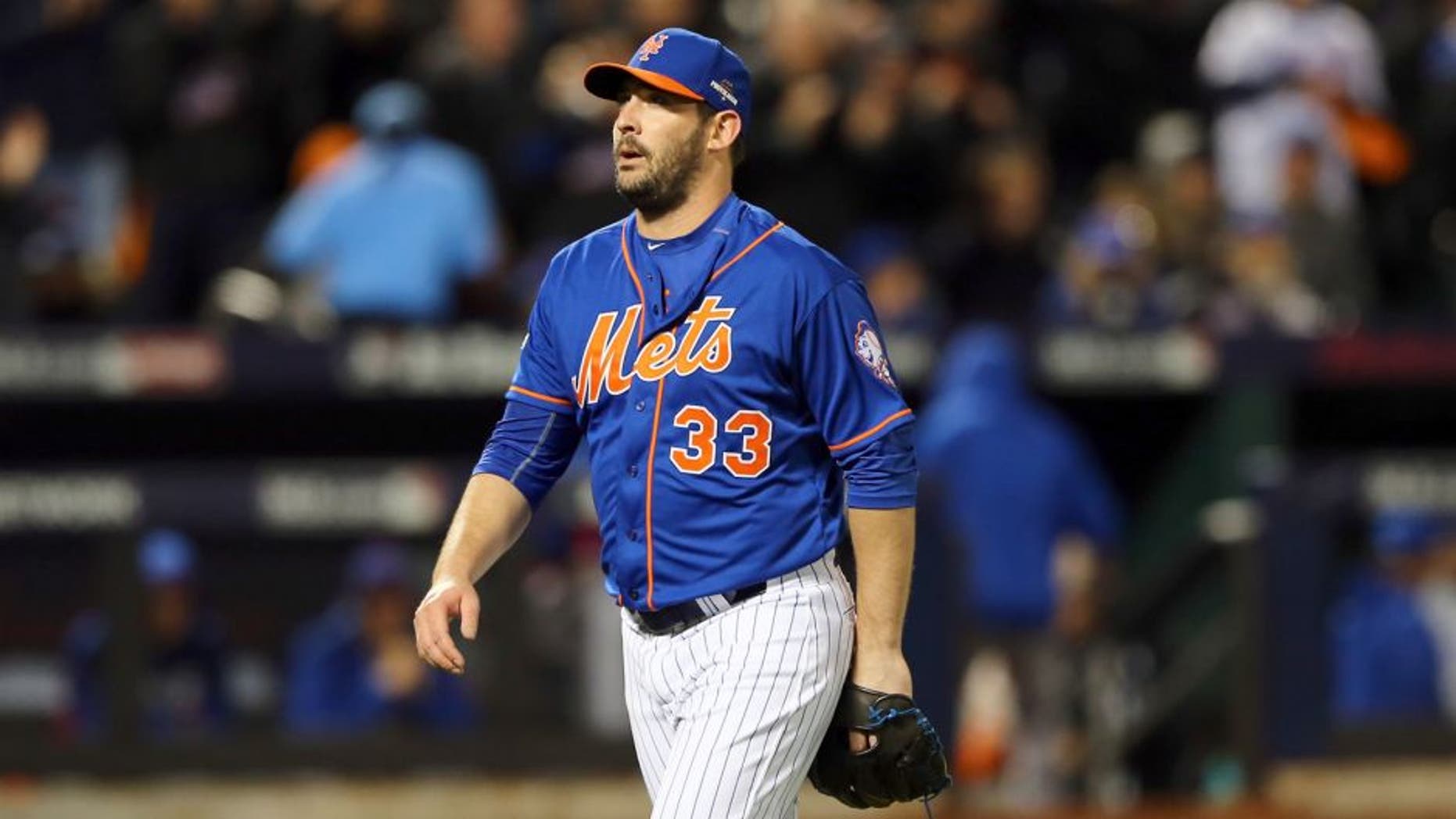 NEW YORK, NY - OCTOBER 17: Matt Harvey #33 of the New York Mets walks back to the dugout after closing out an inning against the Chicago Cubs during game one of the 2015 MLB National League Championship Series at Citi Field on October 17, 2015 in the Flushing neighborhood of the Queens borough of New York City. (Photo by Elsa/Getty Images)