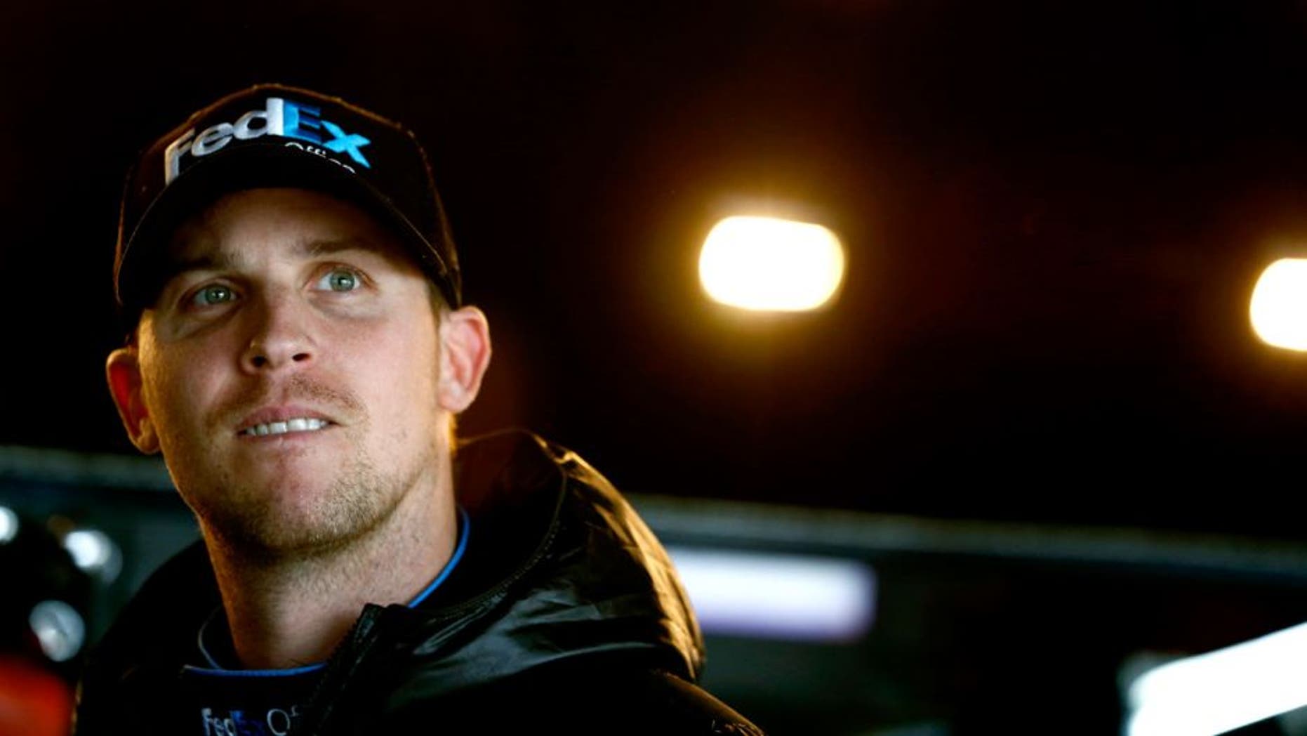 DOVER, DE - OCTOBER 03: Denny Hamlin, driver of the #11 FedEx Office Toyota, prepares to drive during practice for the NASCAR Sprint Cup Series AAA 400 at Dover International Speedway on October 3, 2015 in Dover, Delaware. (Photo by Jeff Zelevansky/NASCAR via Getty Images)