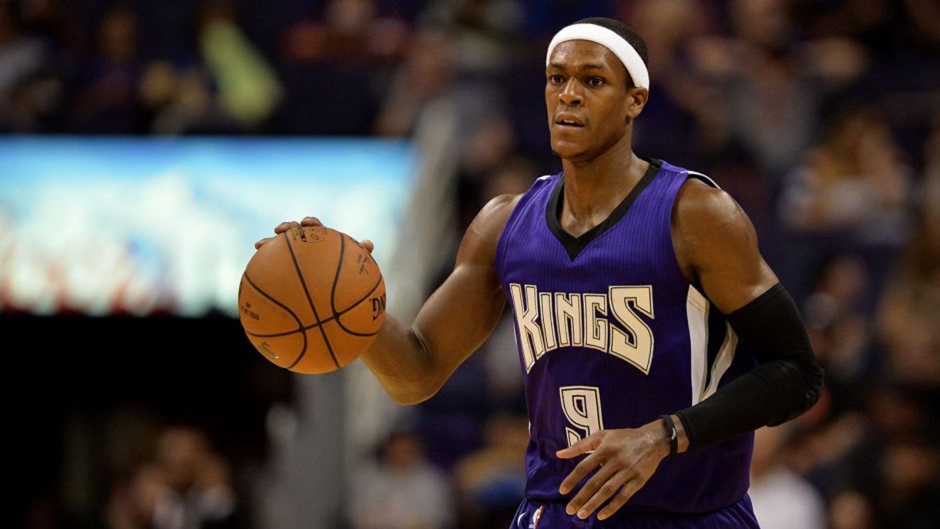 Oct 7, 2015; Phoenix, AZ, USA; Sacramento Kings guard Rajon Rondo (9) dribbles the basketball up the court in the second half against the Phoenix Suns at Talking Stick Resort Arena. The Suns defeat the Kings 102-98. Mandatory Credit: Jennifer Stewart-USA TODAY Sports