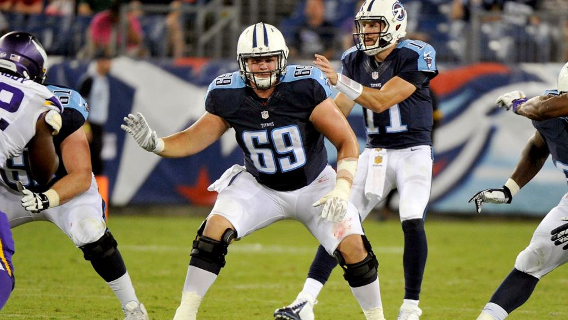 NASHVILLE, TN - SEPTEMBER 03: Andy Gallik #69 of the Tennessee Titans plays during a pre-season game against the Minnesota Vikings at Nissan Stadium on September 3, 2015 in Nashville, Tennessee. (Photo by Frederick Breedon/Getty Images)