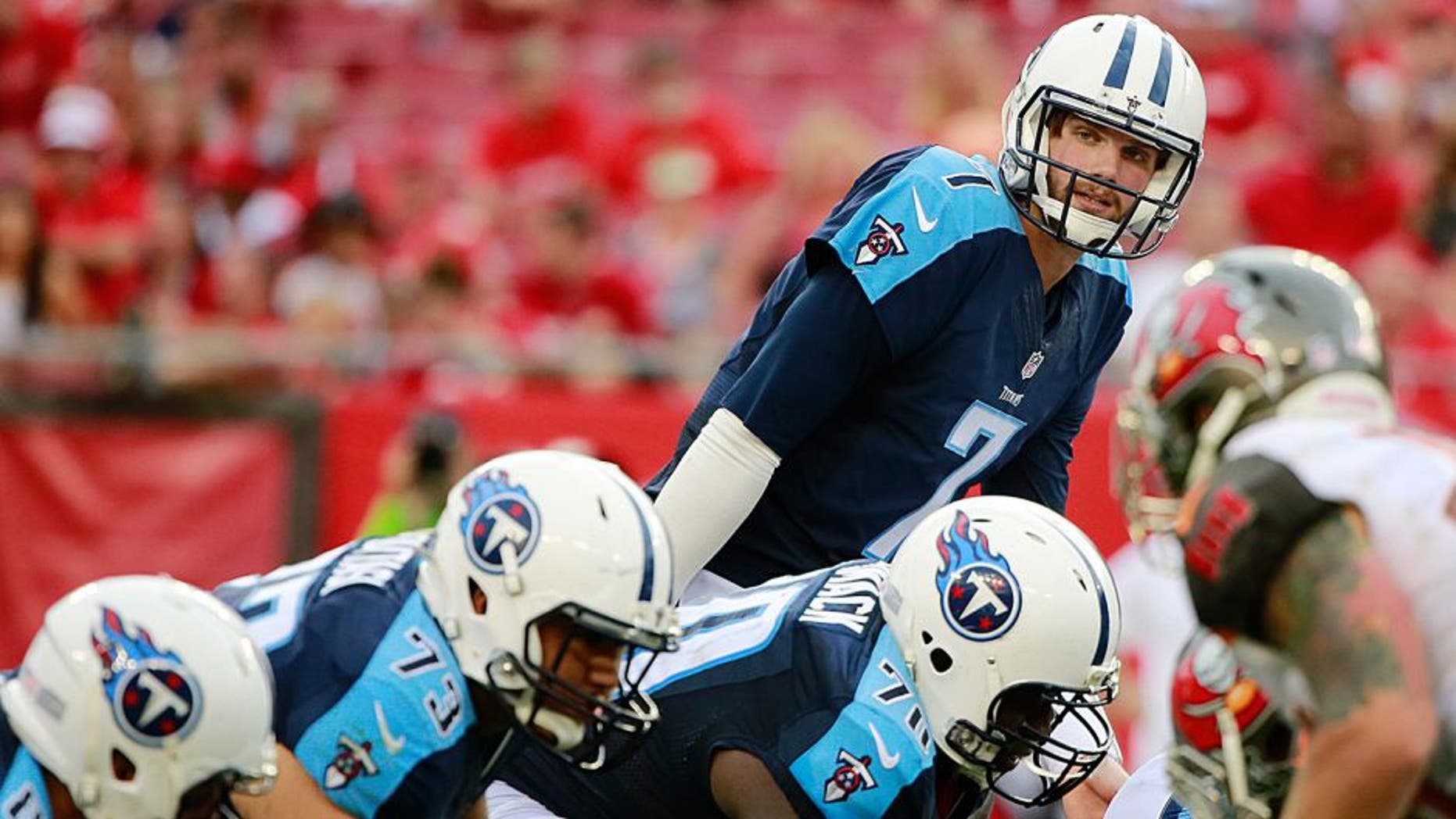 Sep 13, 2015; Tampa, FL, USA; Tennessee Titans quarterback Zach Mettenberger (7) looks on against the Tampa Bay Buccaneers during the second half at Raymond James Stadium. Tennessee Titans defeated the Tampa Bay Buccaneers 42-14. Mandatory Credit: Kim Klement-USA TODAY Sports