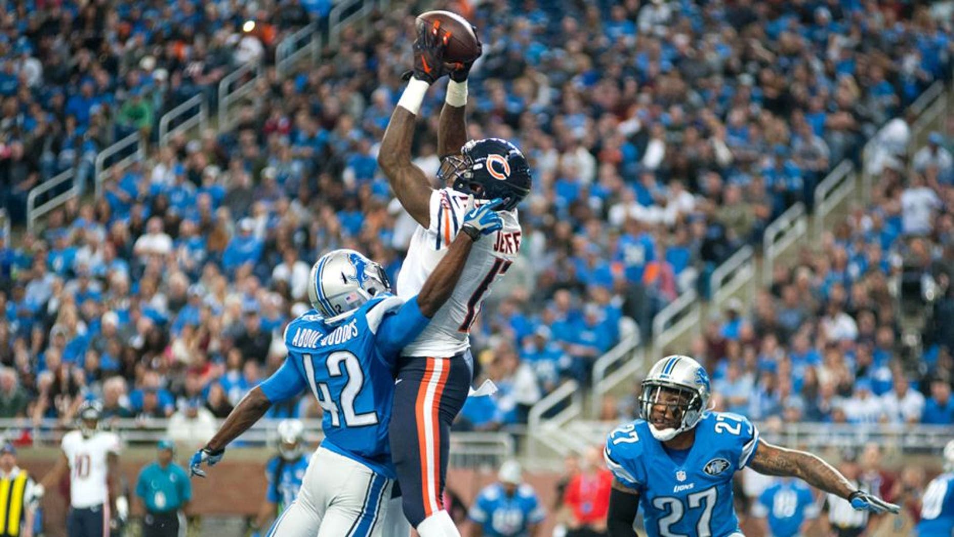 Oct 18, 2015; Detroit, MI, USA; Chicago Bears wide receiver Alshon Jeffery (17) catches a touchdown pass in front of Detroit Lions strong safety Isa Abdul-Quddus (42) during the fourth quarter at Ford Field. Mandatory Credit: Tim Fuller-USA TODAY Sports