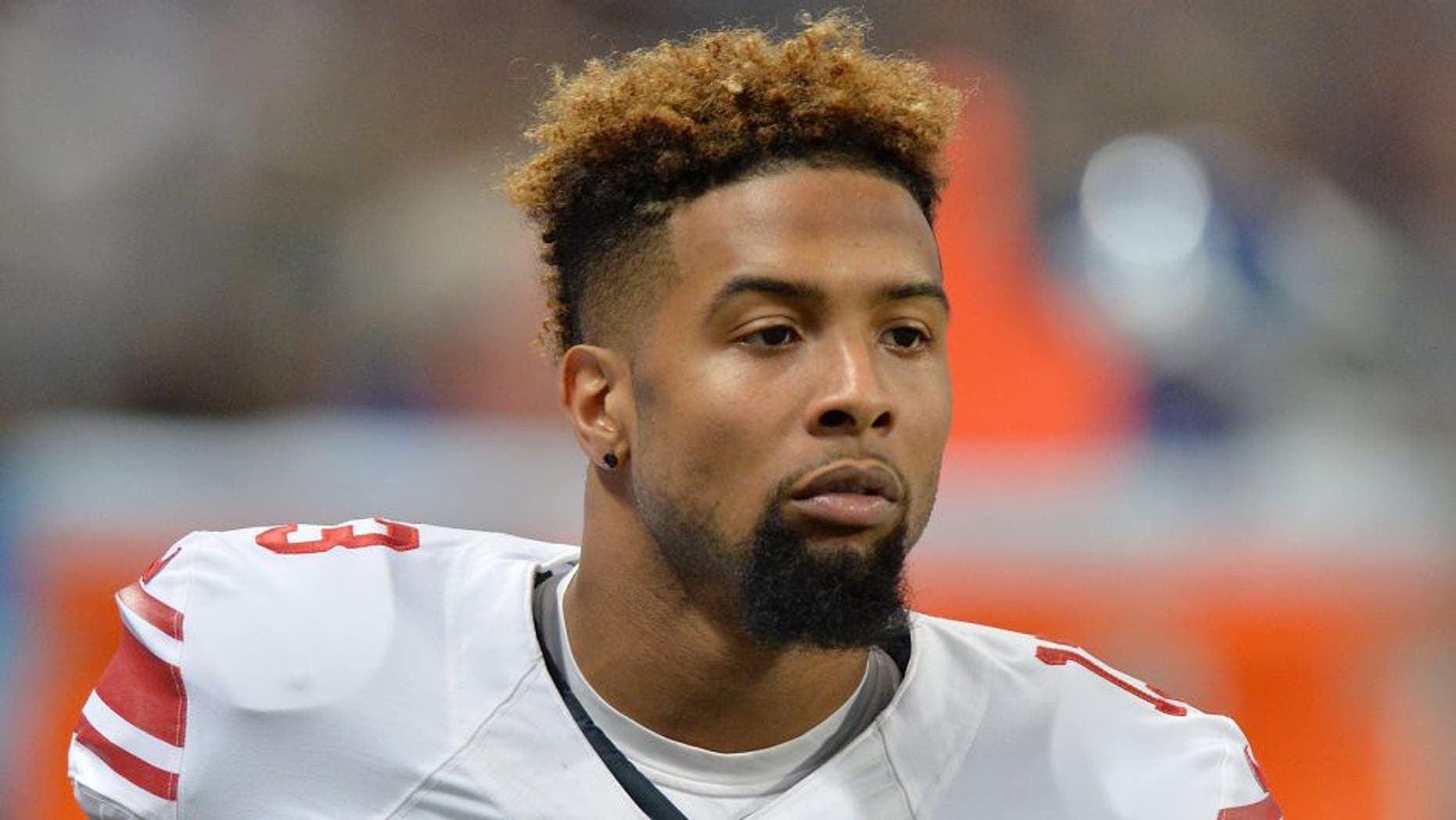 ST. LOUIS, MO - DECEMBER 21: Odell Beckham #13 of the New York Giants watches from the sidelines against the St. Louis Rams at the Edward Jones Dome on December 21, 2014 in St. Louis, Missouri. (Photo by Michael Thomas/Getty Images)