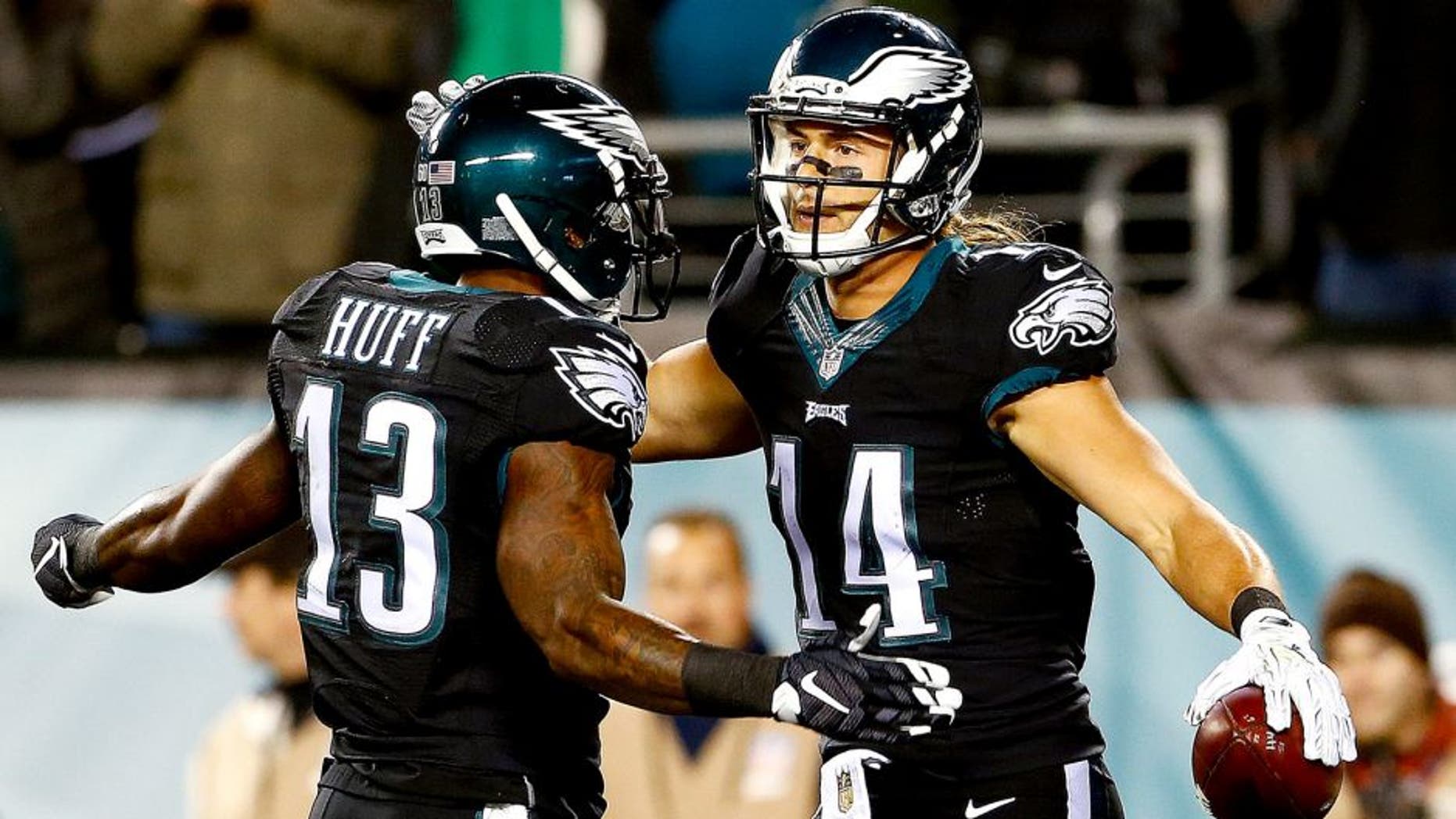PHILADELPHIA, PA - OCTOBER 19: Riley Cooper #14 of the Philadelphia Eagles is congratulated by his teammate Josh Huff #13 after scoring a first quarter touchdown against the New York Giants at Lincoln Financial Field on October 19, 2015 in Philadelphia, Pennsylvania. (Photo by Rich Schultz/Getty Images)