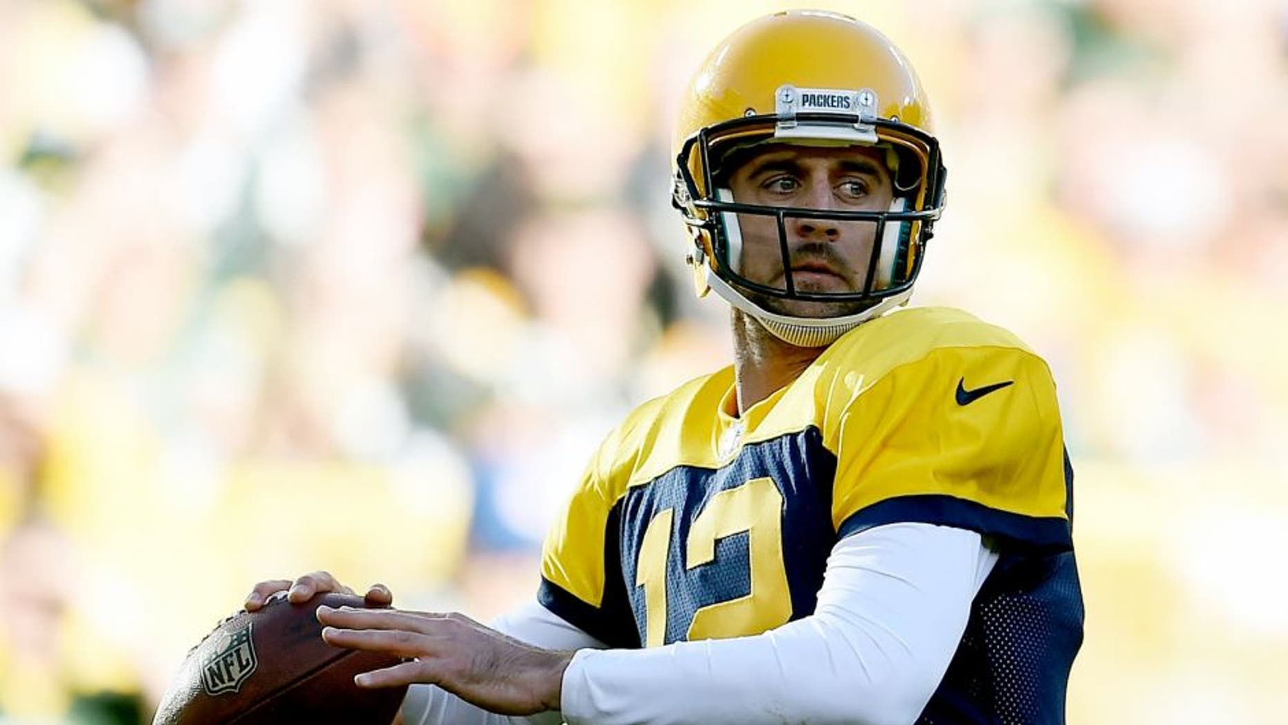 GREEN BAY, WI - OCTOBER 18: Aaron Rodgers #12 of the Green Bay Packers drops back to pass during a game against the San Diego Chargers at Lambeau Field on October 18, 2015 in Green Bay, Wisconsin. Green Bay defeated San Diego 27-20. (Photo by Stacy Revere/Getty Images)