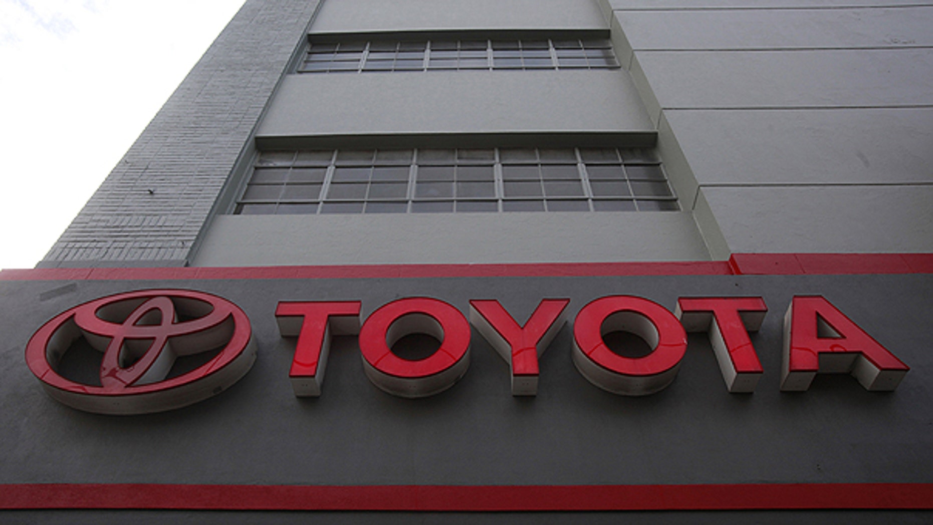 The sign at San Francisco Toyota car dealership is shown in San Francisco, in this Jan. 26, 2010 file photo. Toyota Motor Corp. said Thursday Oct. 21 it is recalling 1.53 million Lexus, Avalon and other models, mostly in the U.S. and Japan, for brake fluid and fuel pump problems.