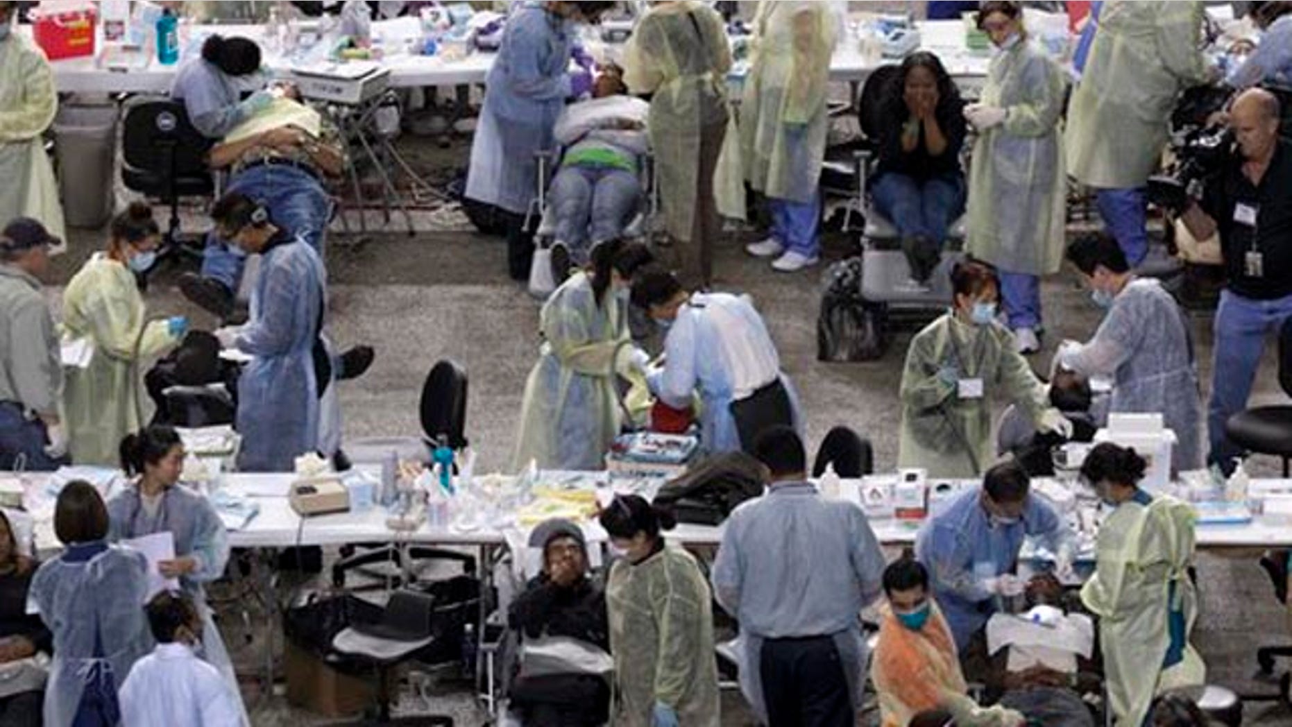 October 20, 2011: Patients receive free dental care at a free health clinic sponsored by CareNow at the Los Angeles Sports Arena.
