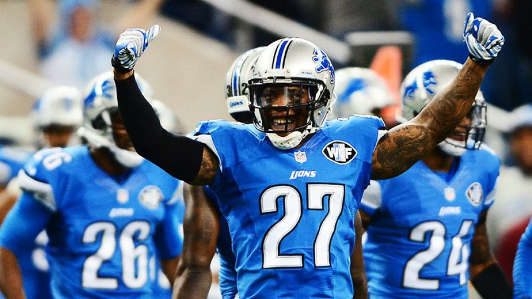 Oct 19, 2014; Detroit, MI, USA; Detroit Lions free safety Glover Quin (27) celebrates after defeating the New Orleans Saints 24-23 at Ford Field. Mandatory Credit: Andrew Weber-USA TODAY Sports