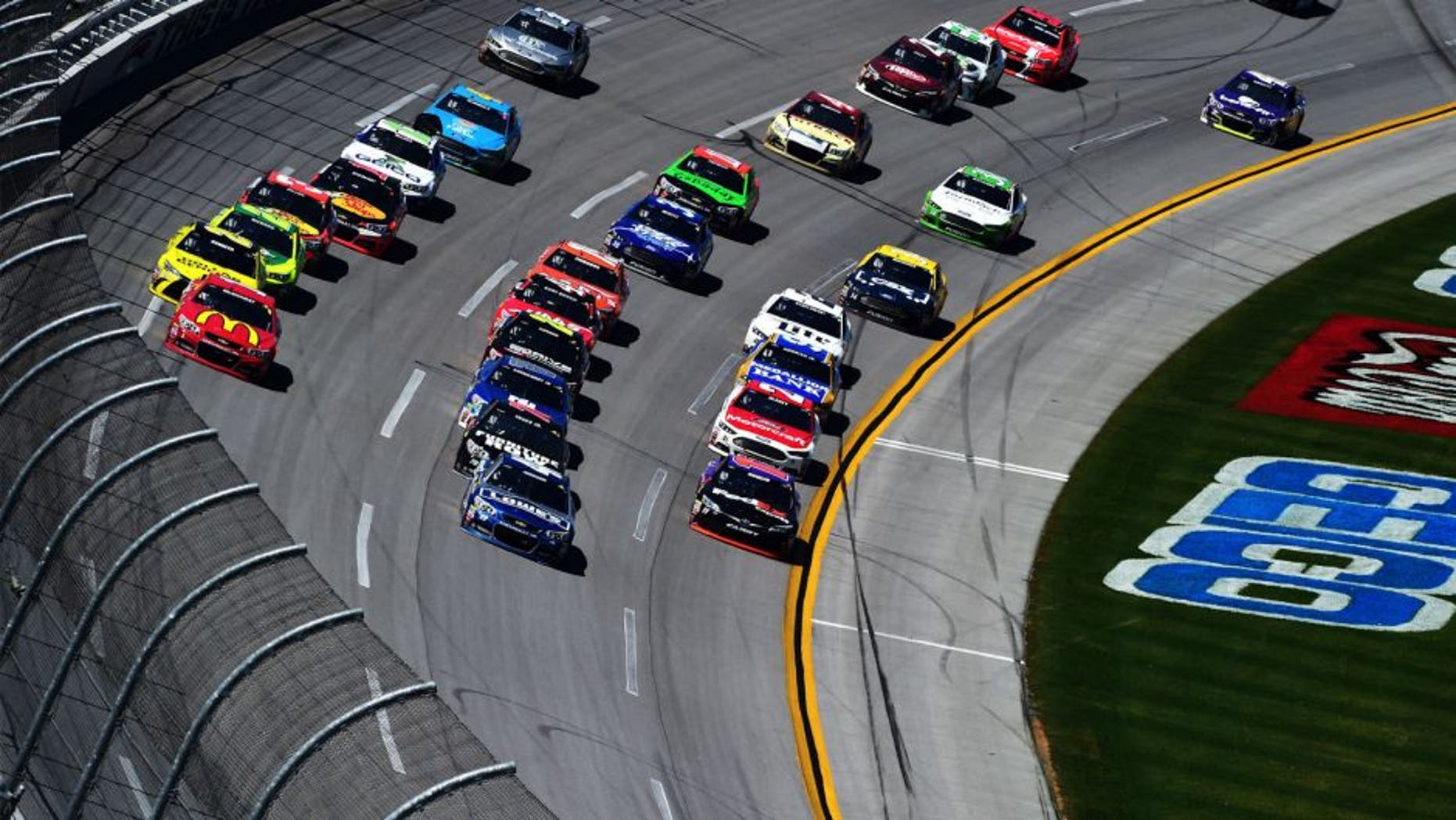 TALLADEGA, AL - MAY 03: Jimmie Johnson, driver of the #48 Lowe's Chevrolet, leads the field during the NASCAR Sprint Cup Series GEICO 500 at Talladega Superspeedway on May 3, 2015 in Talladega, Alabama. (Photo by Jared C. Tilton/Getty Images)