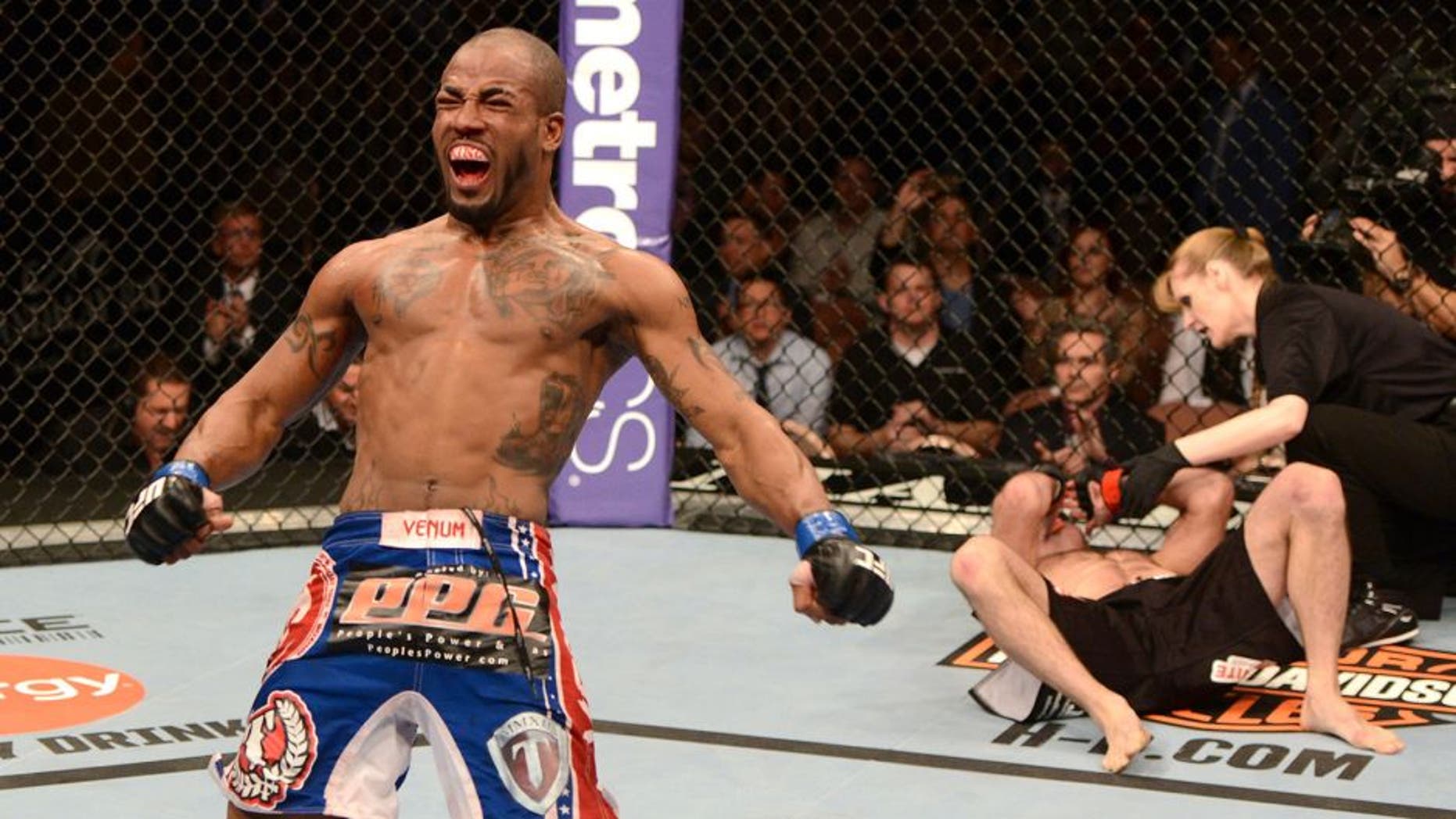LAS VEGAS, NV - FEBRUARY 02: Bobby Green (L) reacts after defeating Jacob Volkmann during their lightweight fight at UFC 156 on February 2, 2013 at the Mandalay Bay Events Center in Las Vegas, Nevada. (Photo by Donald Miralle/Zuffa LLC/Zuffa LLC via Getty Images)