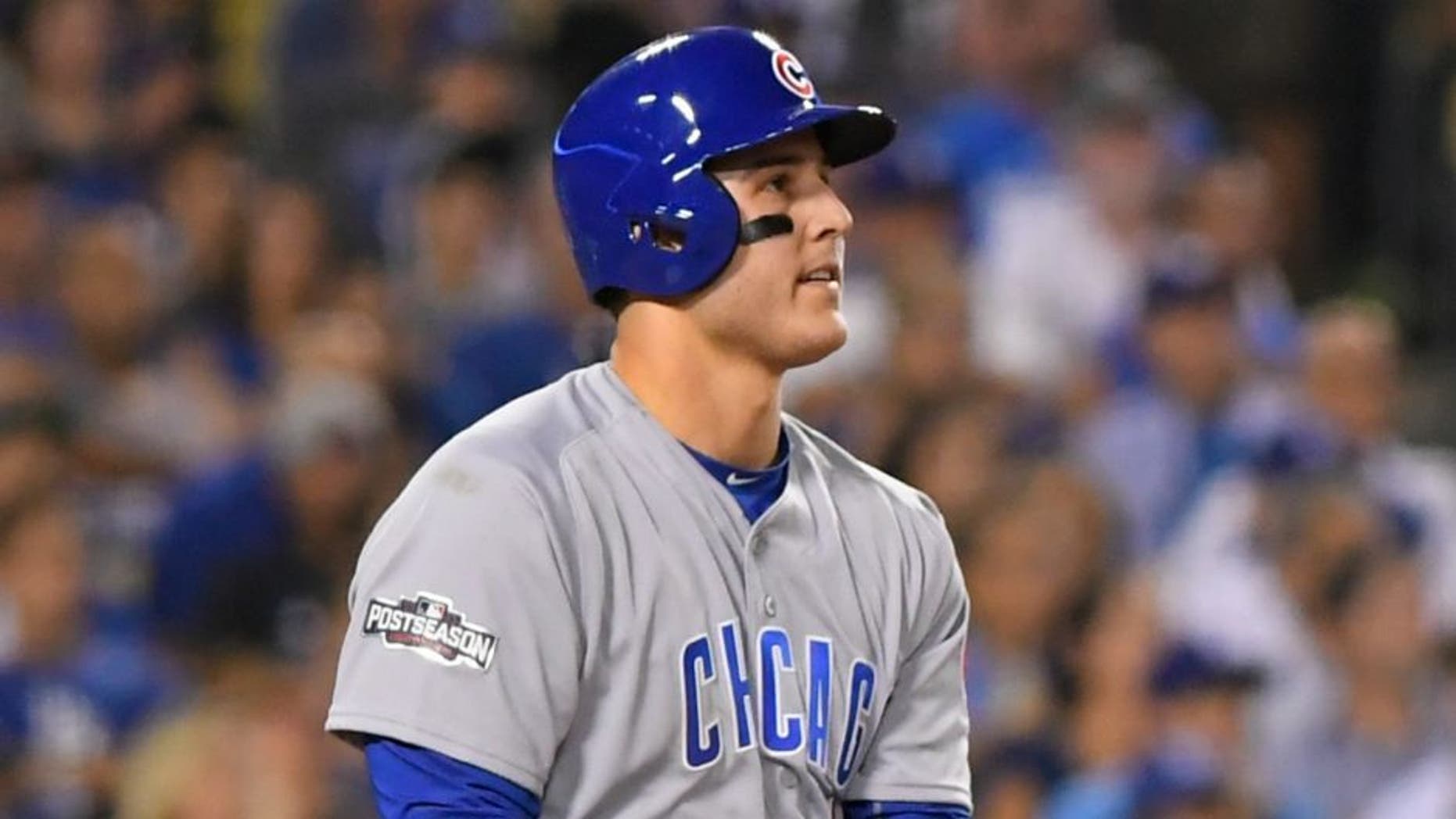 Chicago Cubs' Anthony Rizzo hits a home run during the fifth inning of Game 4 of the National League baseball championship series against the Los Angeles Dodgers Wednesday, Oct. 19, 2016, in Los Angeles. (AP Photo/Mark J. Terrill)