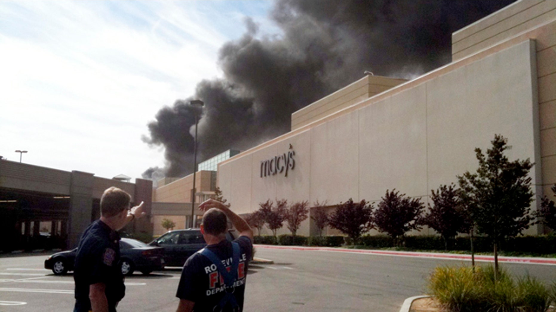 Oct. 21: Smoke billows out of the of the Roseville Galleria after a man entered a store earlier in the day and set the shop on fire in Roseville, Calif.