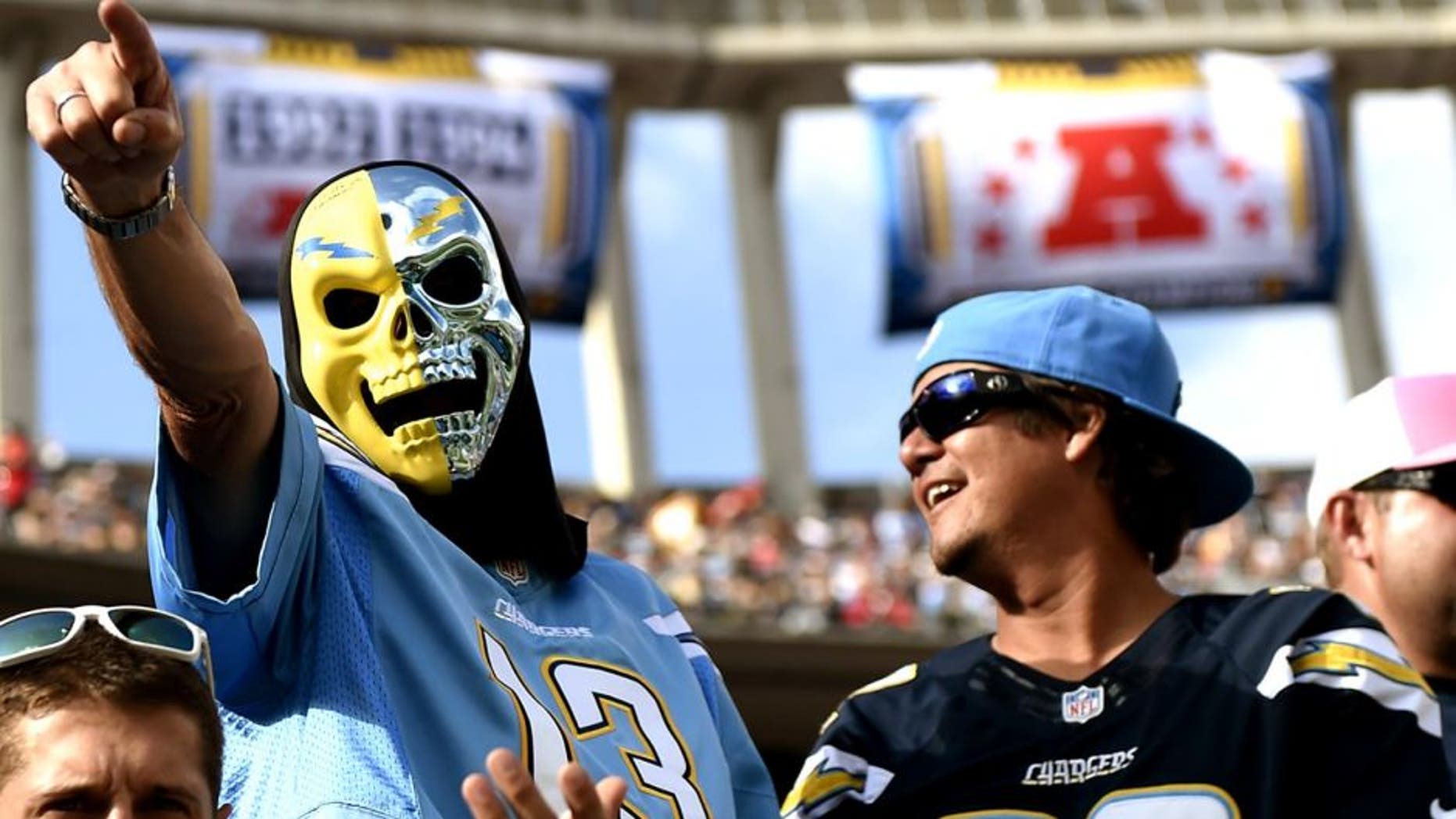 SAN DIEGO, CA - OCTOBER 19: San Diego Chargers fans cheer for their team during the NFL football game against Kansas City Chiefs at Qualcomm Stadium on October 19, 2014, in San Diego, California. (Photo by Kevork Djansezian/Getty Images)
