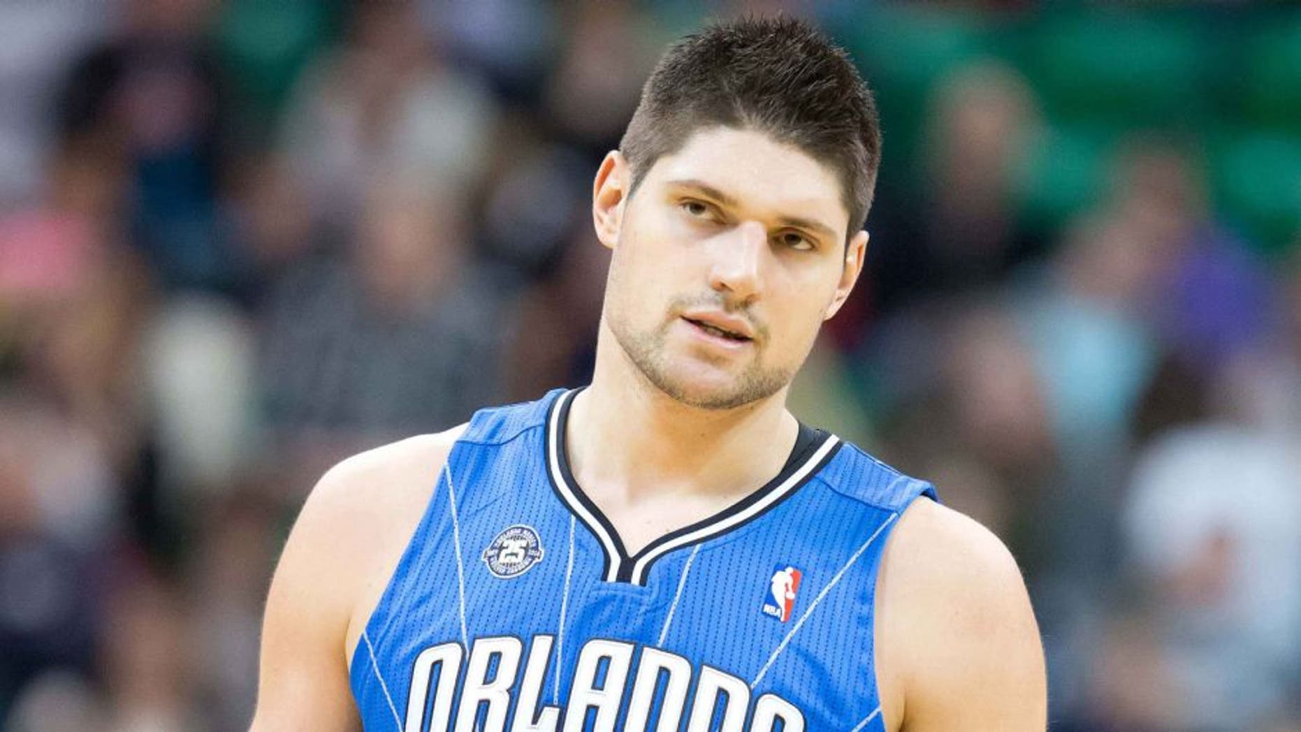 Mar 22, 2014; Salt Lake City, UT, USA; Orlando Magic center Nikola Vucevic (9) reacts during the second half against the Utah Jazz at EnergySolutions Arena. The Jazz won 89-88. Mandatory Credit: Russ Isabella-USA TODAY Sports