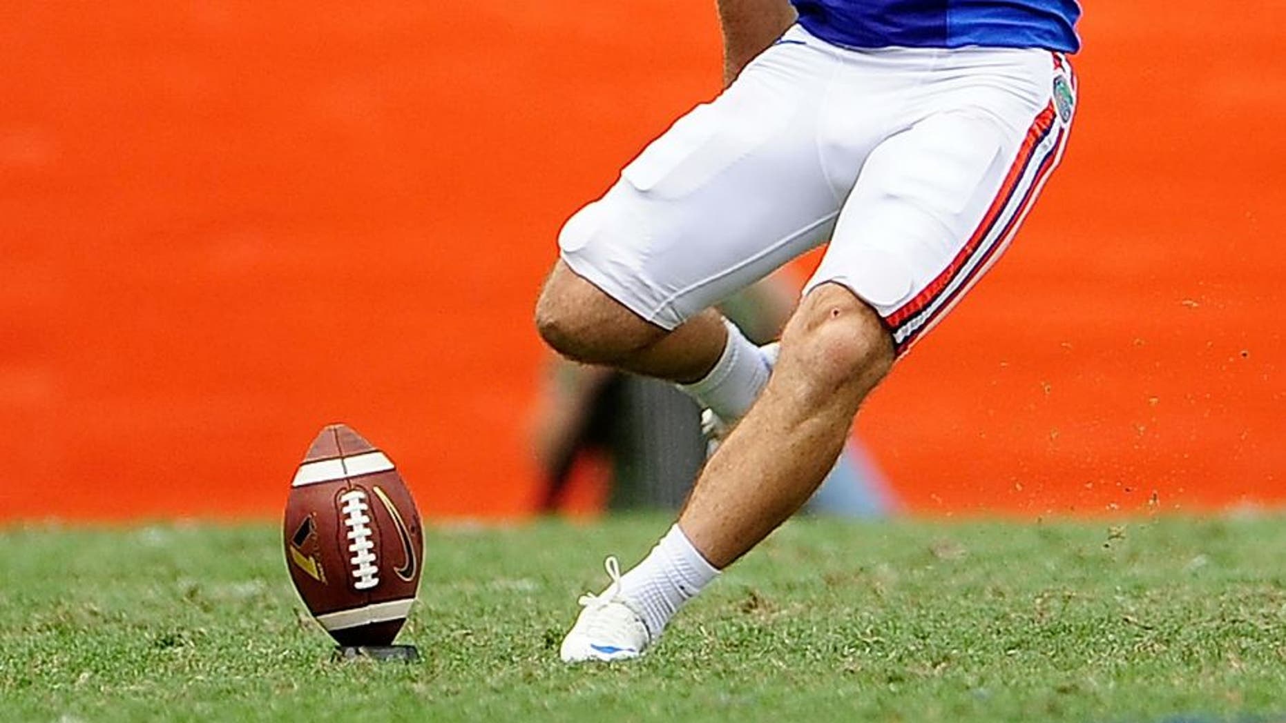 GAINESVILLE, FL - AUGUST 31: Austin Hardin #16 of the Florida Gators kicks off to the Toldeo Rockets during a game at Ben Hill Griffin Stadium on August 31, 2013 in Gainesville, Florida. Florida won the game 24-6. (Photo by Stacy Revere/Getty Images)