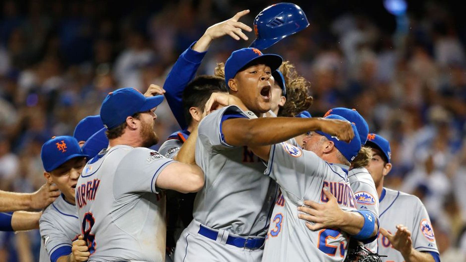 LOS ANGELES, CA - OCTOBER 15: Jeurys Familia #27 of the New York Mets celebrates after the Mets 3-2 victory against the Los Angeles Dodgers in game five of the National League Division Series at Dodger Stadium on October 15, 2015 in Los Angeles, California. (Photo by Sean M. Haffey/Getty Images)