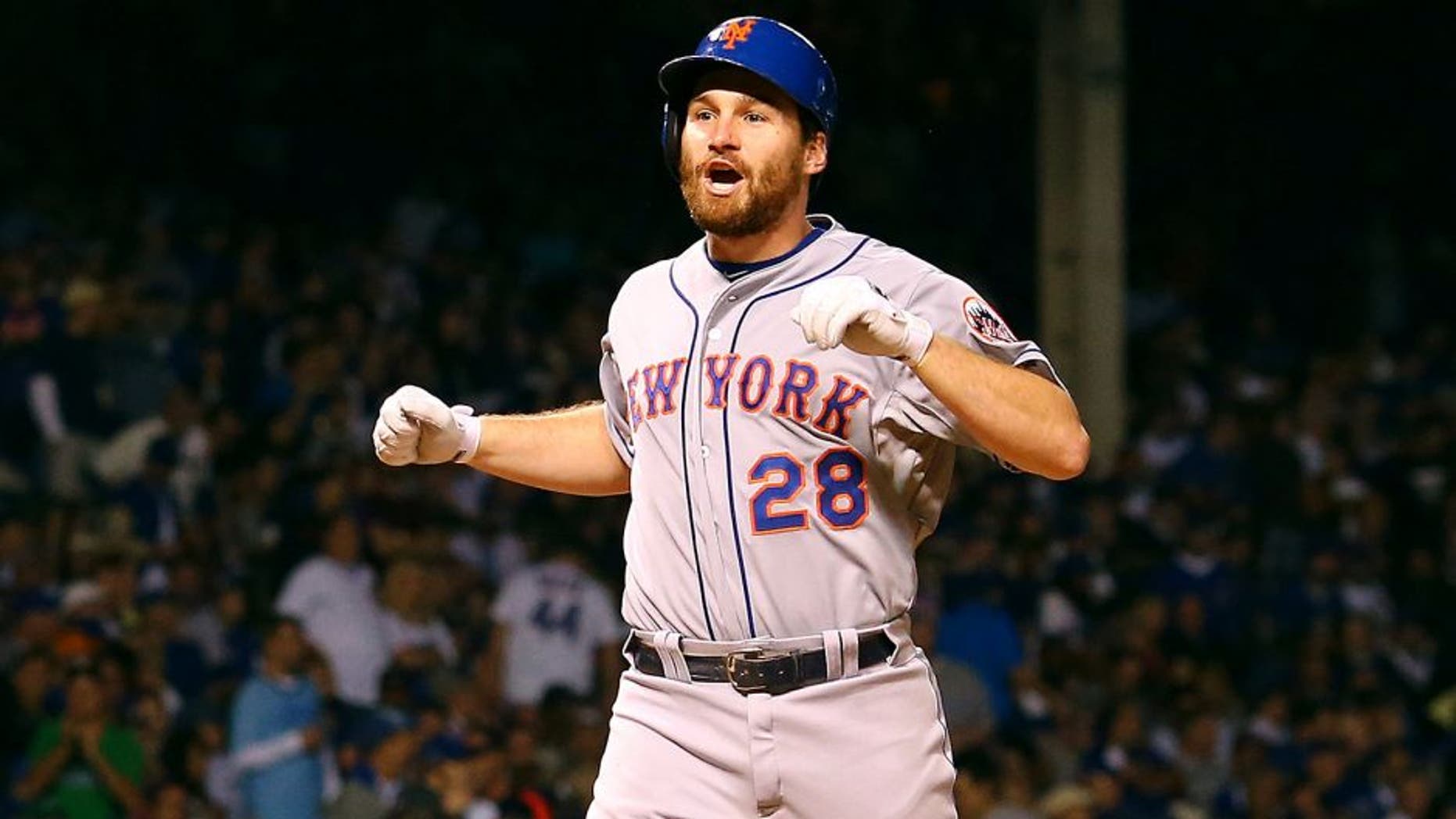 CHICAGO, IL - OCTOBER 21: Daniel Murphy #28 of the New York Mets celebrates after hitting a two run home run in the eighth inning against Pedro Strop #46 of the Chicago Cubs during game four of the 2015 MLB National League Championship Series at Wrigley Field on October 21, 2015 in Chicago, Illinois. (Photo by Elsa/Getty Images)