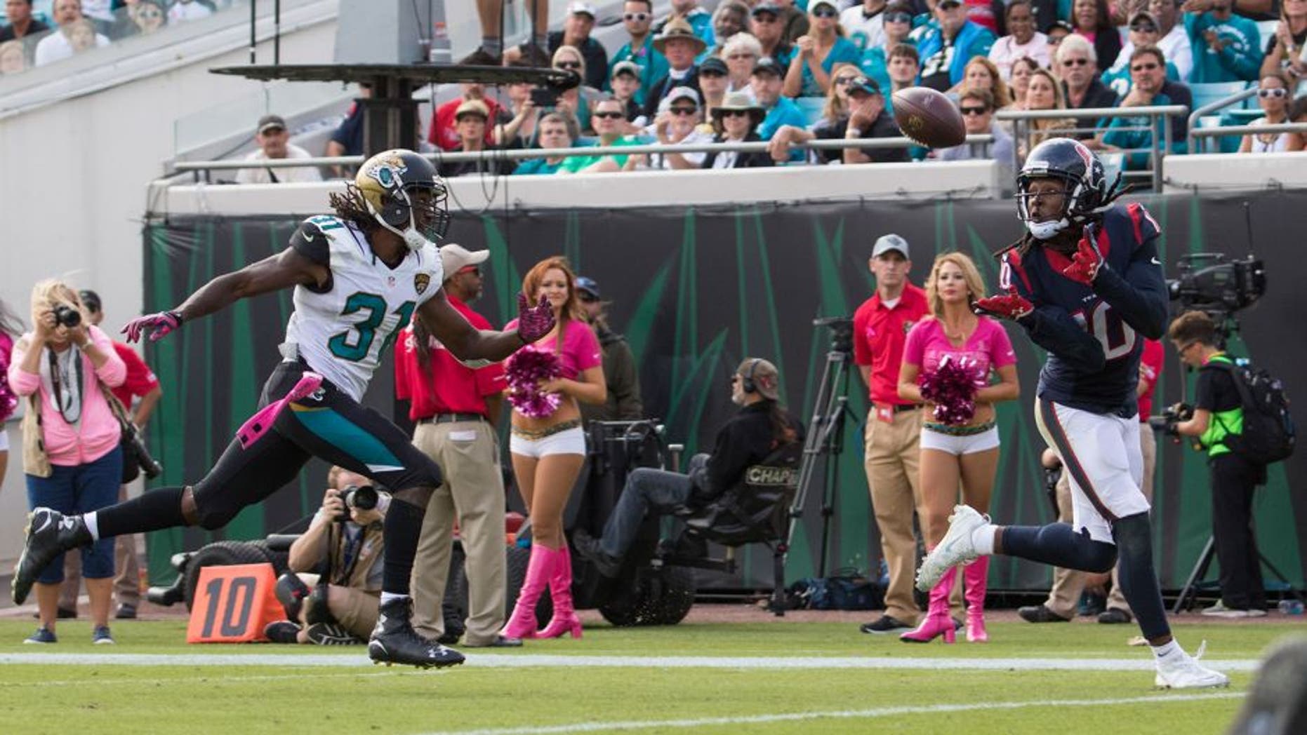 Oct 18, 2015; Jacksonville, FL, USA; Houston Texans wide receiver DeAndre Hopkins (10) beats Jacksonville Jaguars cornerback Davon House (31) for a touchdown in the fourth quarter at EverBank Field. The Houston Texans won 31-20. Mandatory Credit: Logan Bowles-USA TODAY Sports