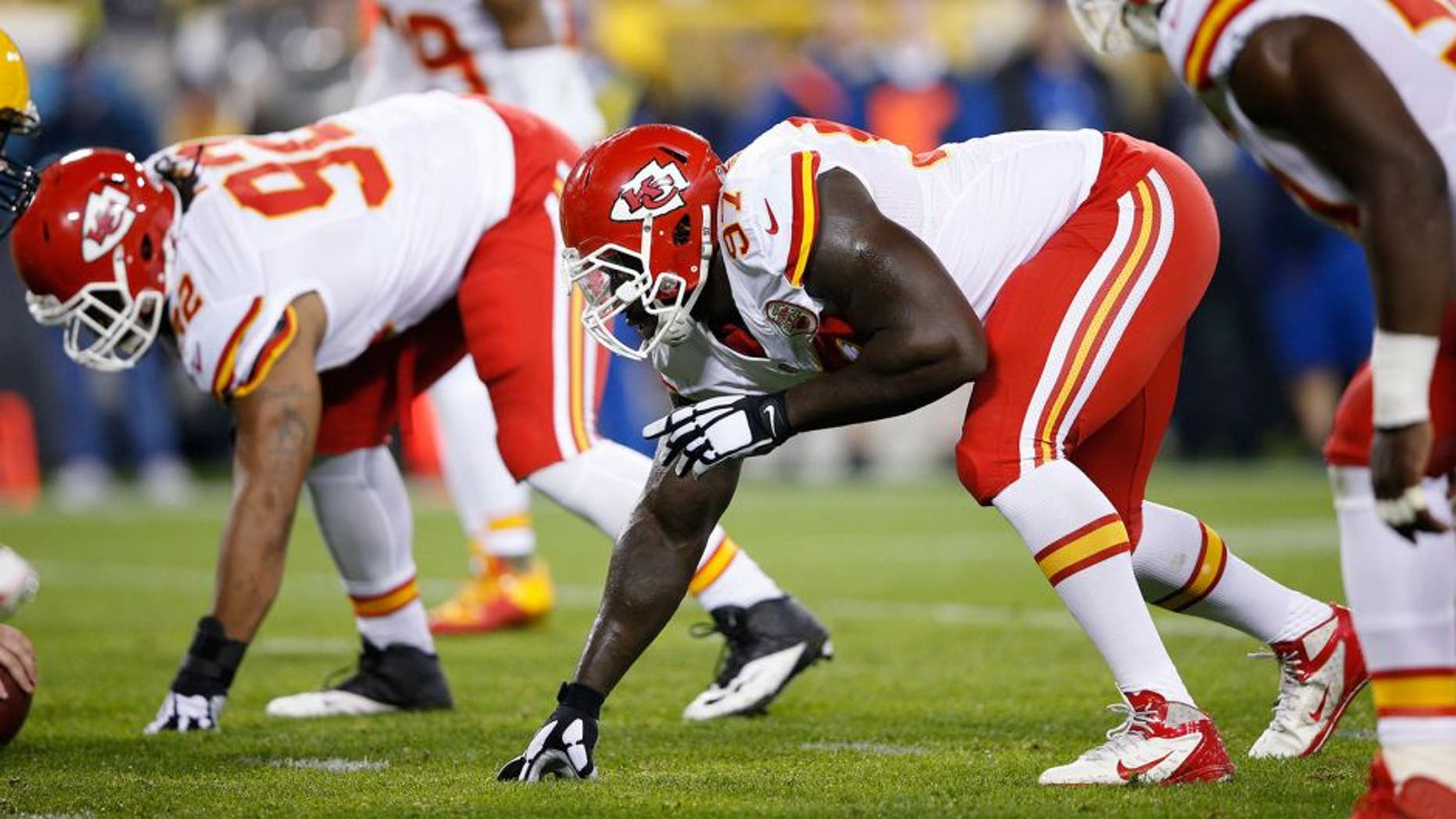GREEN BAY, WI - SEPTEMBER 28: Allen Bailey #97 of the Kansas City Chiefs lines up against the Green Bay Packers during a game at Lambeau Field on September 28, 2015 in Green Bay, Wisconsin. The Packers defeated the Chiefs 38-28. (Photo by Joe Robbins/Getty Images)