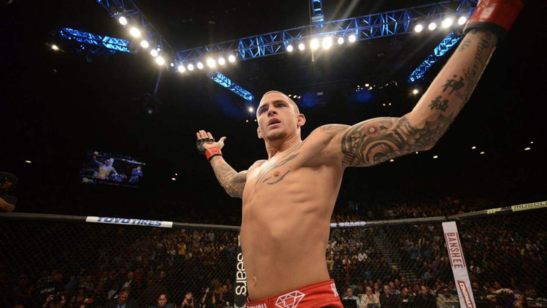 LAS VEGAS, NV - DECEMBER 28: Dustin Poirier reacts to his victory over Diego Brandao in their featherweight bout during the UFC 168 event at the MGM Grand Garden Arena on December 28, 2013 in Las Vegas, Nevada. (Photo by Donald Miralle/Zuffa LLC/Zuffa LLC via Getty Images)