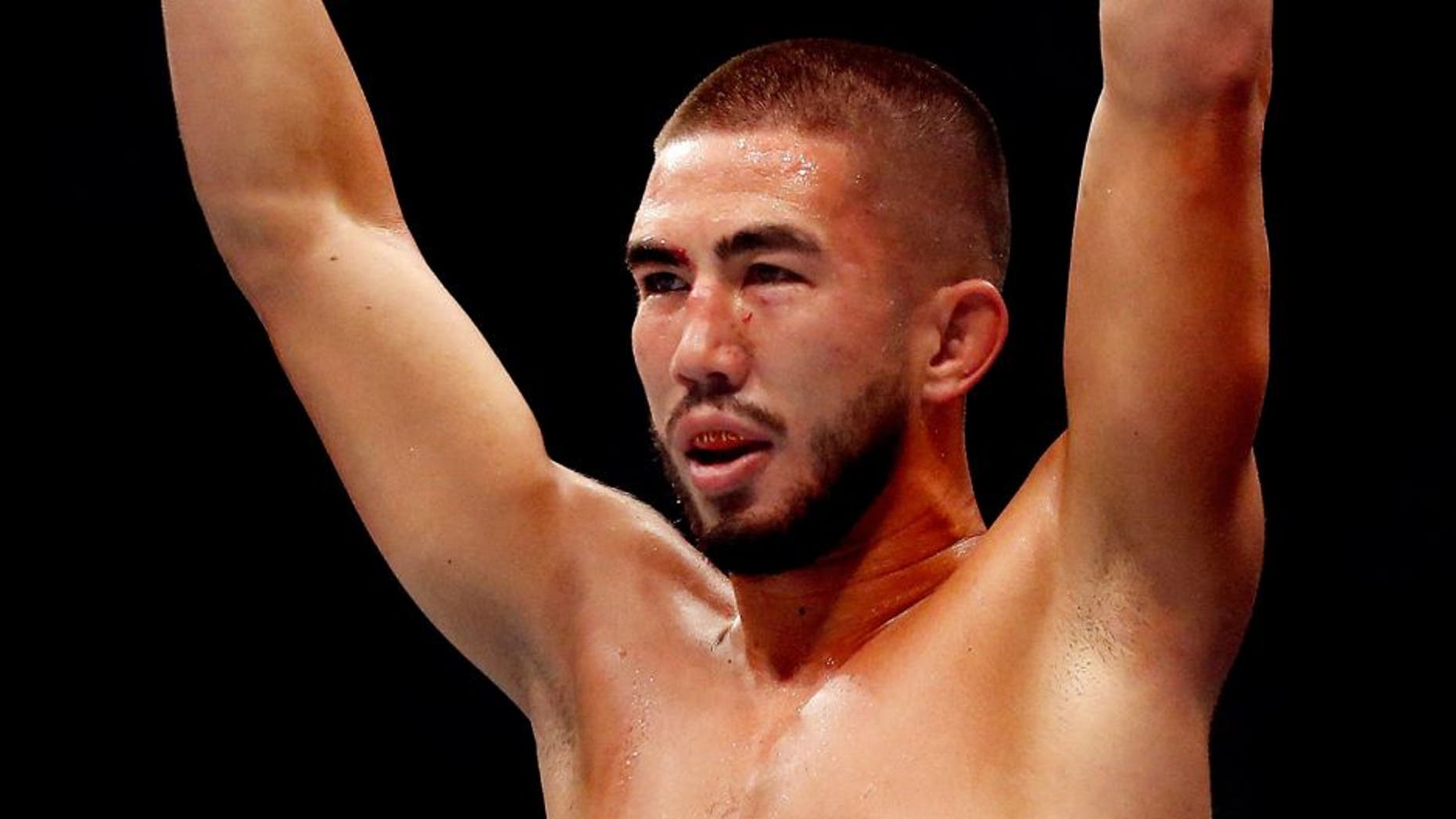 LAS VEGAS, NV - JULY 11: Louis Smolka reacts to his victory over Neil Seery in their flyweight fight during the UFC 189 event inside MGM Grand Garden Arena on July 11, 2015 in Las Vegas, Nevada. (Photo by Christian Petersen/Zuffa LLC/Zuffa LLC via Getty Images)